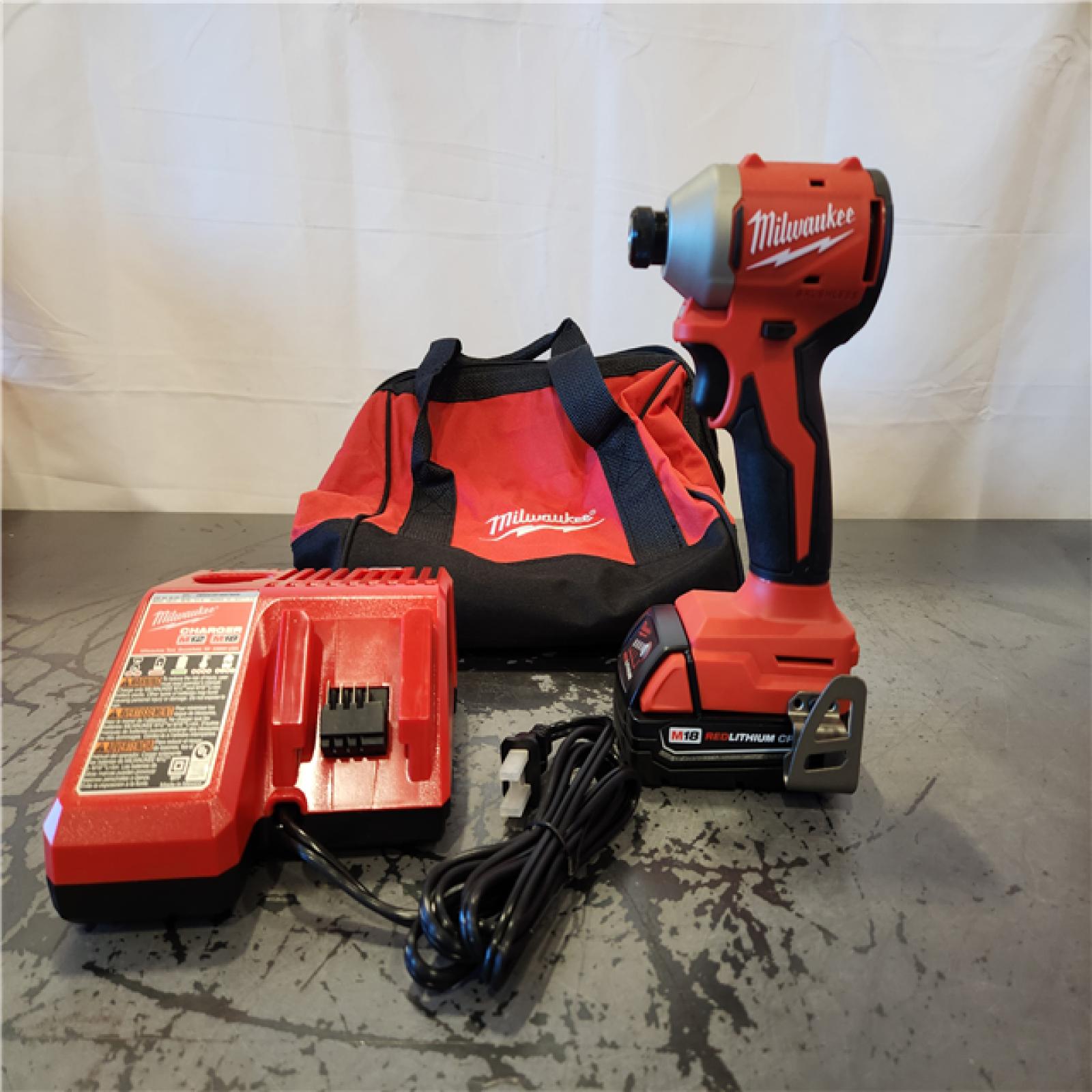AS-IS- Milwaukee M18 Compact Brushless 1/4  Hex Impact Driver Kit