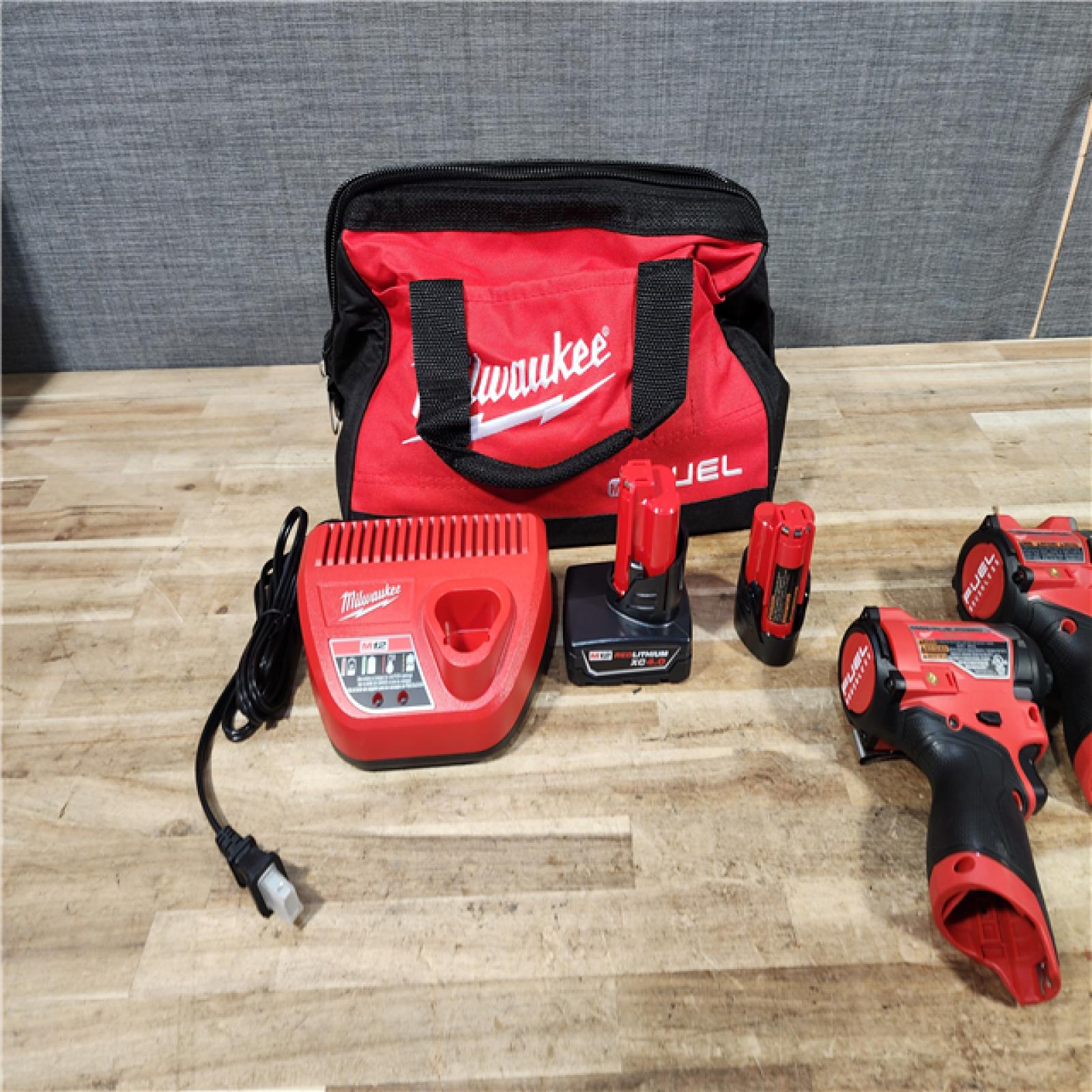 HOUSTON LOCATION - AS - IS Milwaukee FUEL 12-Volt Lithium-Ion Brushless Cordless Hammer Drill and Impact Driver Combo Kit
