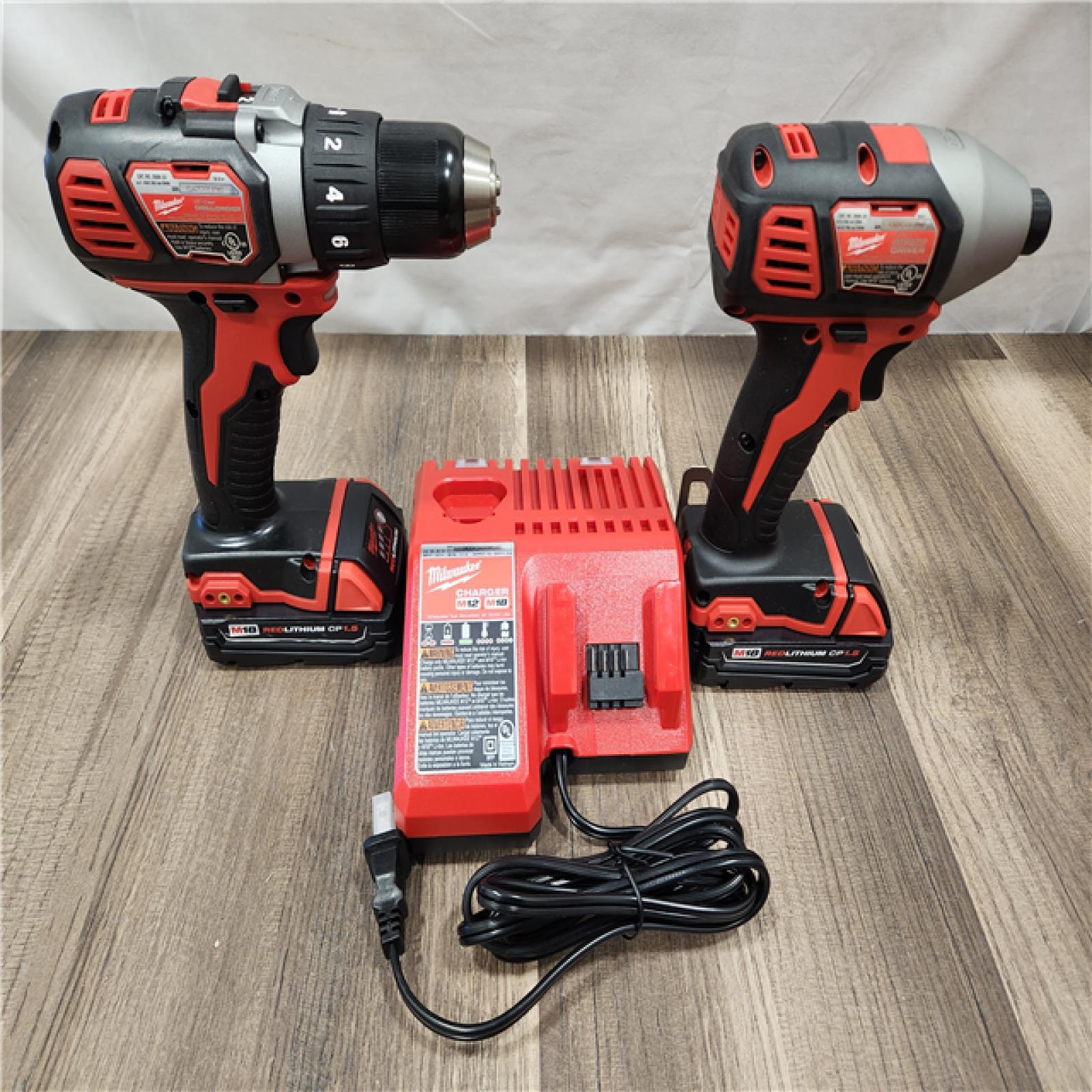 AS-IS- Milwaukee 18V Cordless Brushed 2-Tool Drill/Driver and Impact Driver Kit