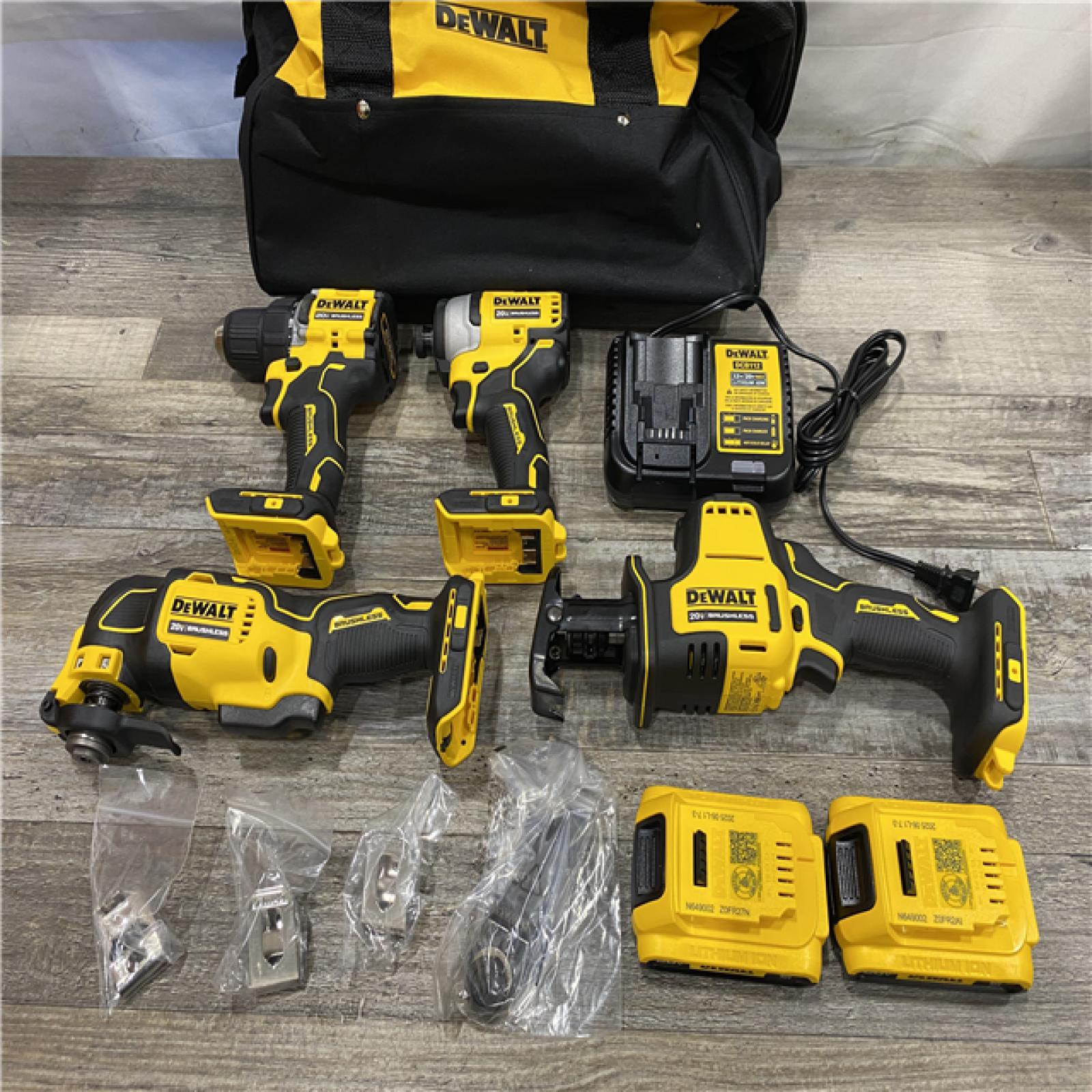 LIKE NEW - DEWALT ATOMIC 20-Volt Lithium-Ion Cordless Brushless (4-Tool) Combo Kit