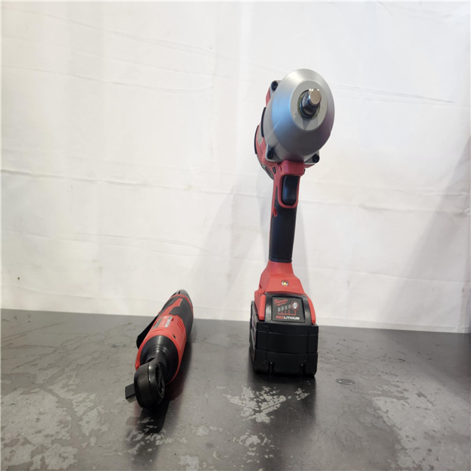 AS-IS- Milwaukee 12/18V Lithium-Ion Cordless 3/8 in. Ratchet and 1/2 in. High Torque Impact Wrench with Friction Ring Combo Kit