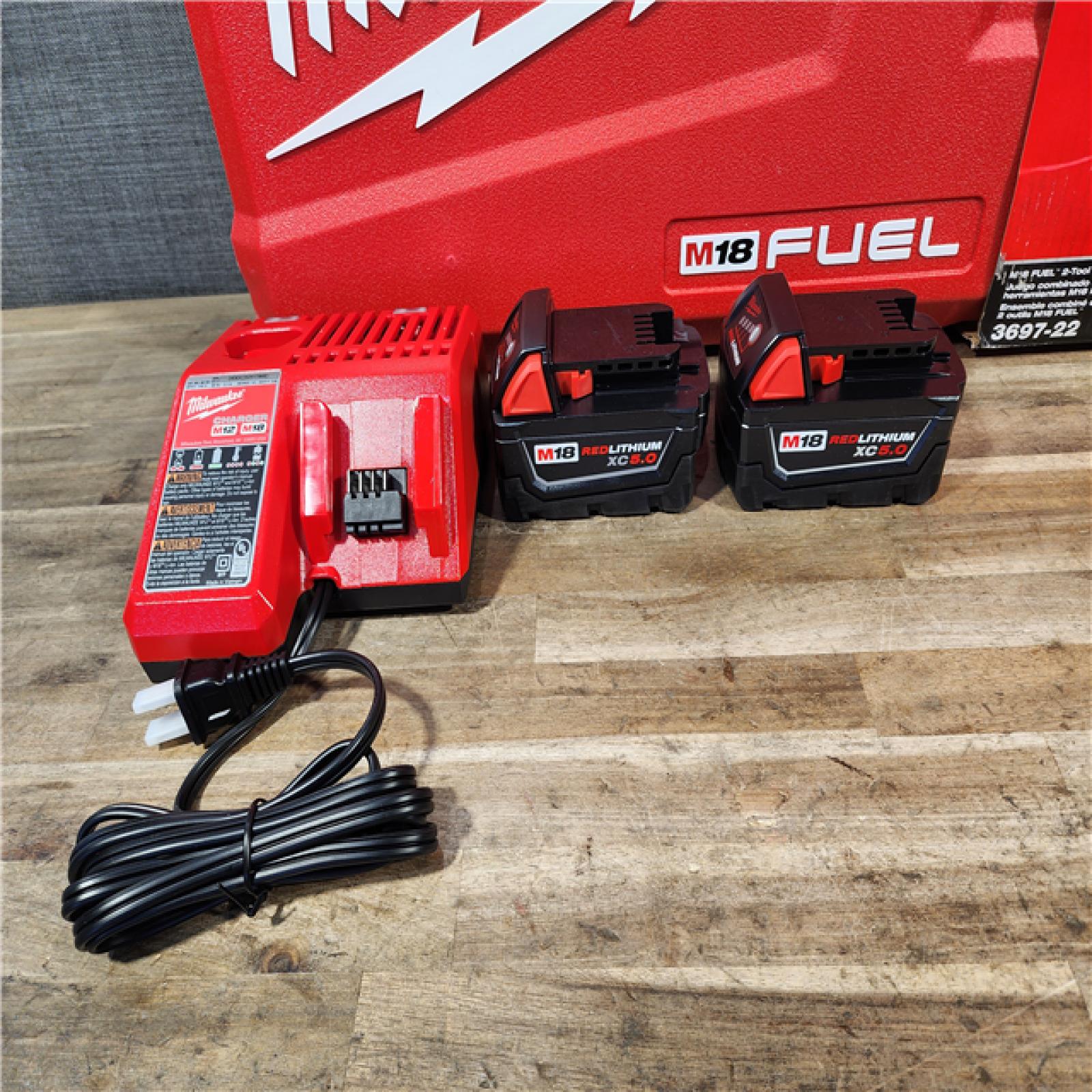 HOUSTON LOCATION - AS-IS Milwaukee FUEL 18V Lithium-Ion Brushless Cordless Hammer Drill and Impact Driver Combo Kit