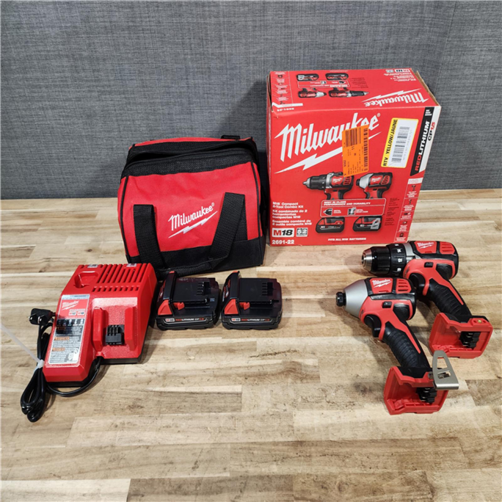 HOUSTON LOCATION - AS-IS Milwaukee 18V Lithium-Ion Cordless Drill Driver/Impact Driver Combo Kit