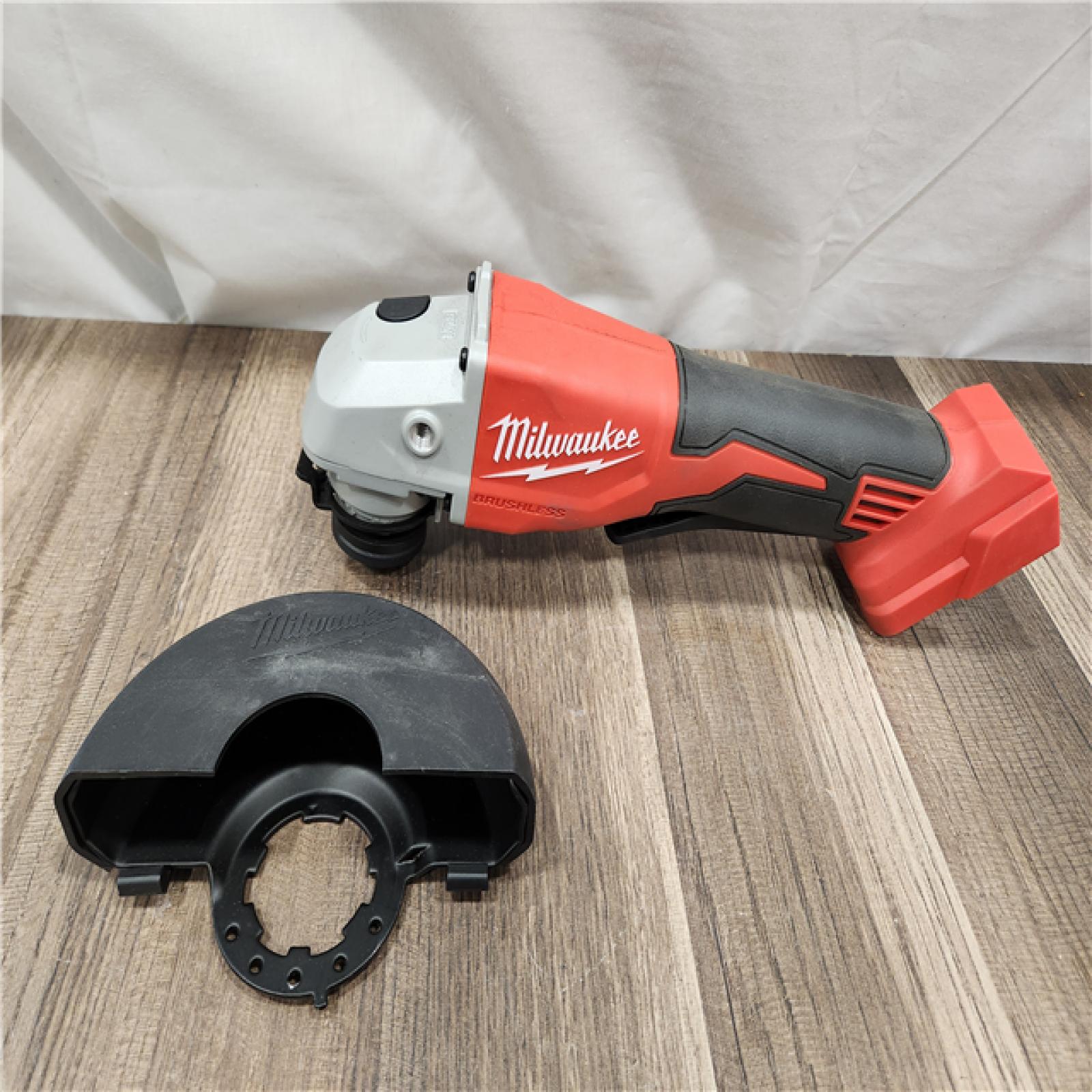 AS-IS- Milwaukee 18V Cordless 4.5 /5  Grinder W/ Paddle Switch (Tool Only)