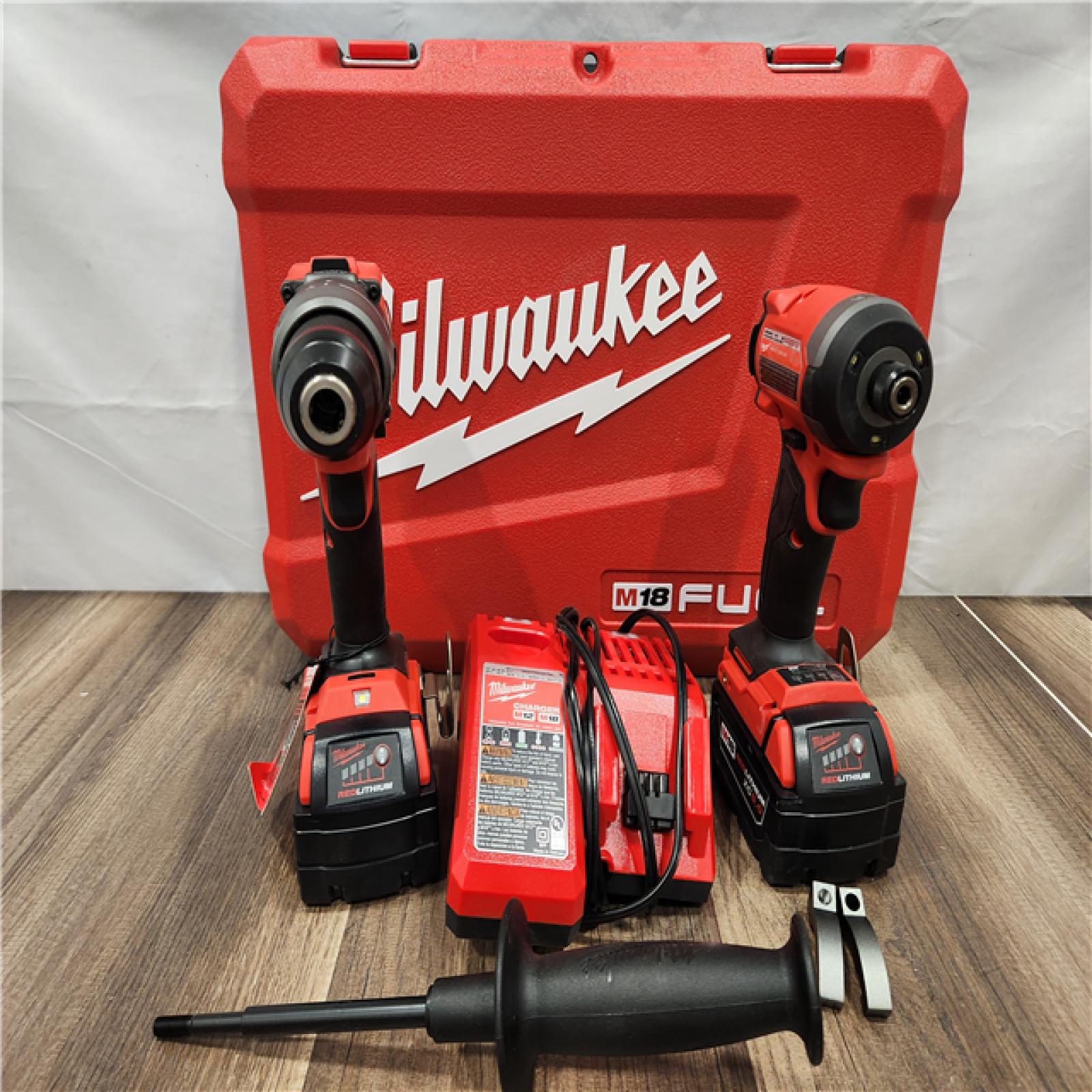 AS-IS - MILWAUKEE FUEL 18V Lithium-Ion Brushless Cordless Hammer Drill and Impact Driver Combo Kit (2-Tool) with 2 Batteries