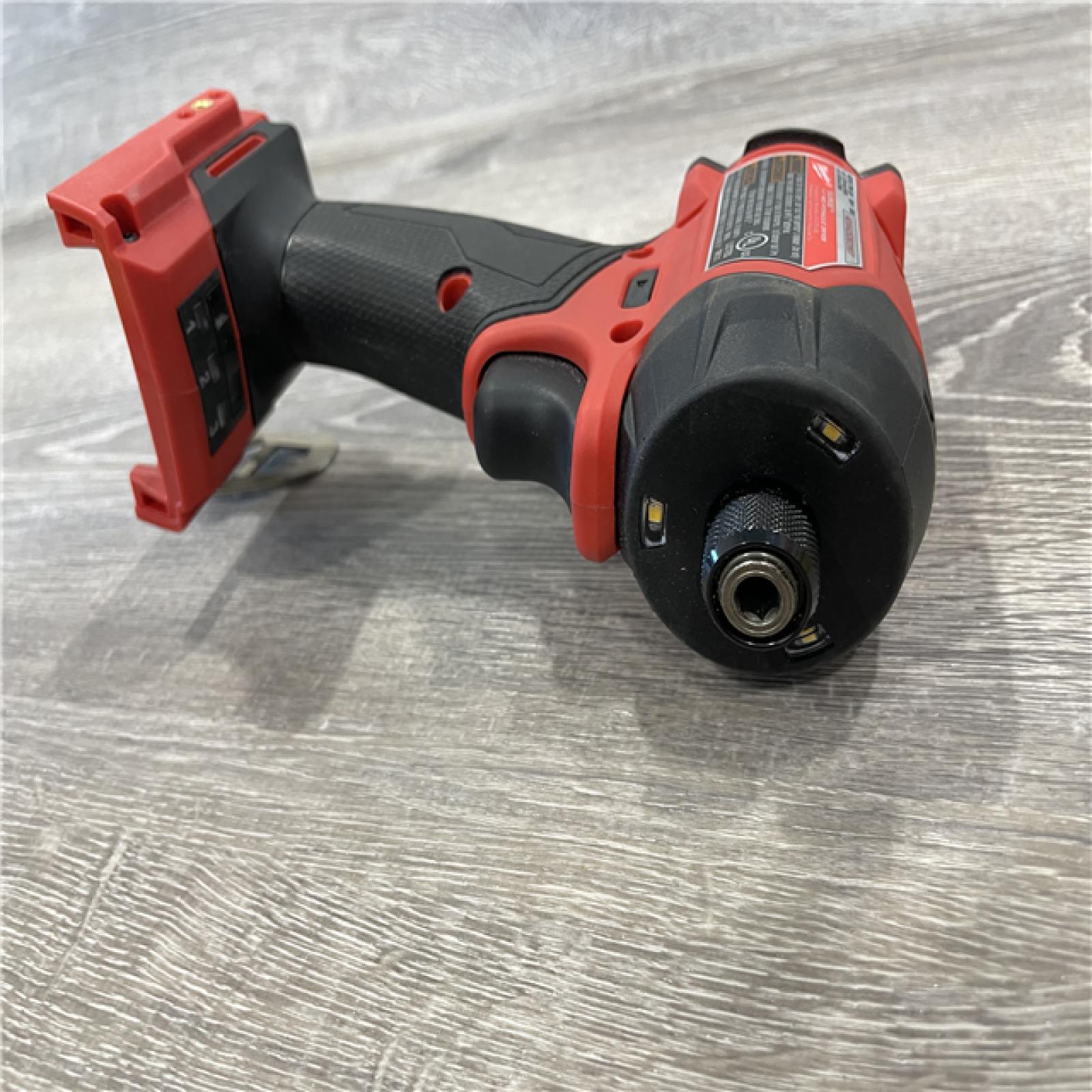 AS-IS  Milwaukee FUEL SURGE 18V Lithium-Ion Brushless Cordless 1/4 in. Hex Impact Driver (Tool-Only)