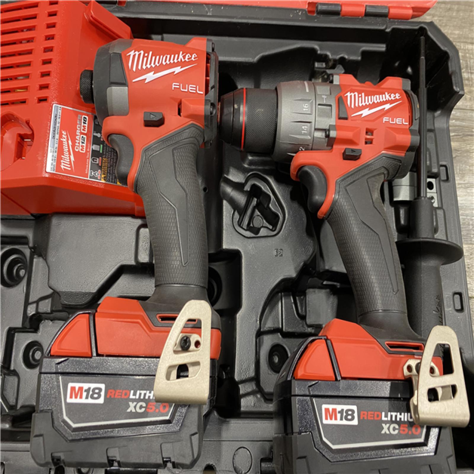 AS-IS Milwaukee FUEL 18V Lithium-Ion Brushless Cordless Hammer Drill and Impact Driver Combo Kit