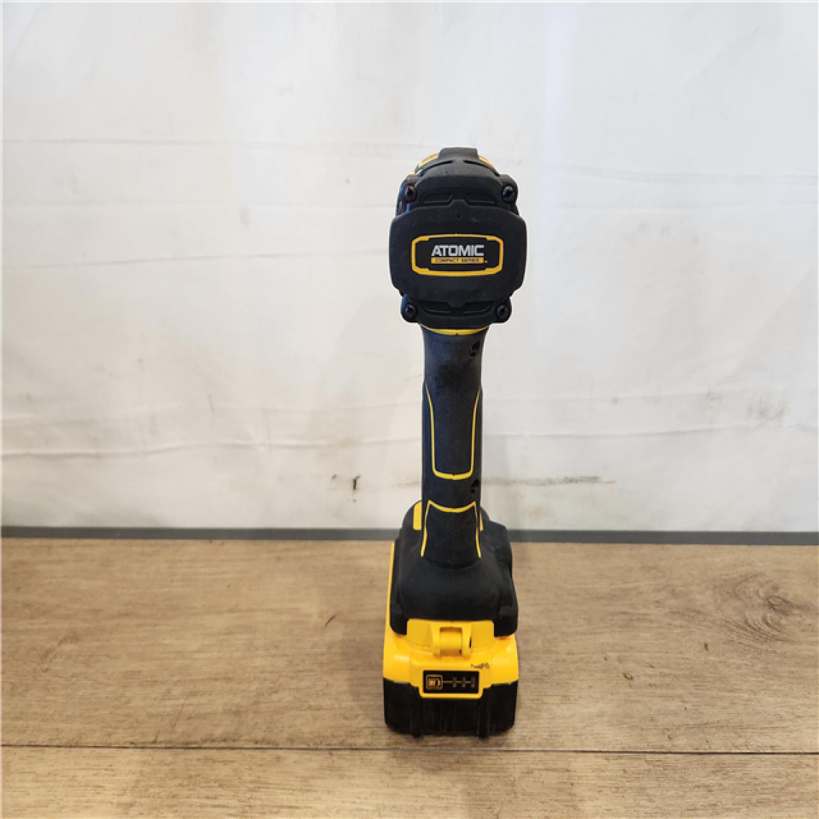 AS-IS- DEWALT ATOMIC 20V MAX Lithium-Ion Cordless 1/4 in. Brushless Impact Driver Kit  5 Ah Battery  Charger  and Bag
