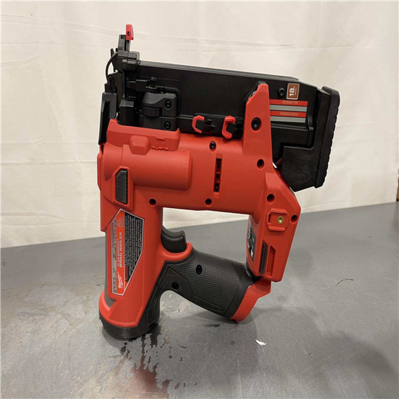 AS-IS - Milwaukee M12 FUEL 12-Volt Lithium-Ion Brushless Cordless 18-Guage Compact Brad Nailer