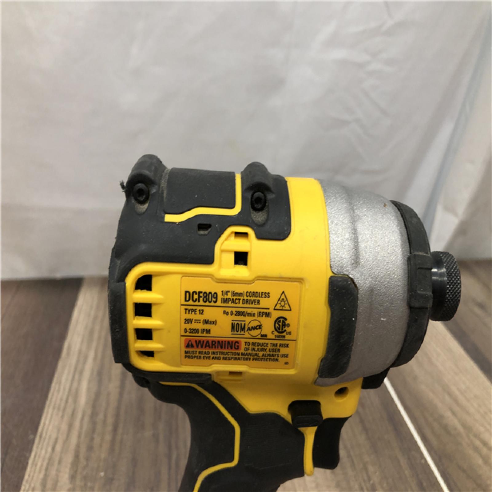 AS-IS DEWALT ATOMIC 20V MAX Cordless Brushless Compact 1/4 in. Impact Driver (Tool Only)