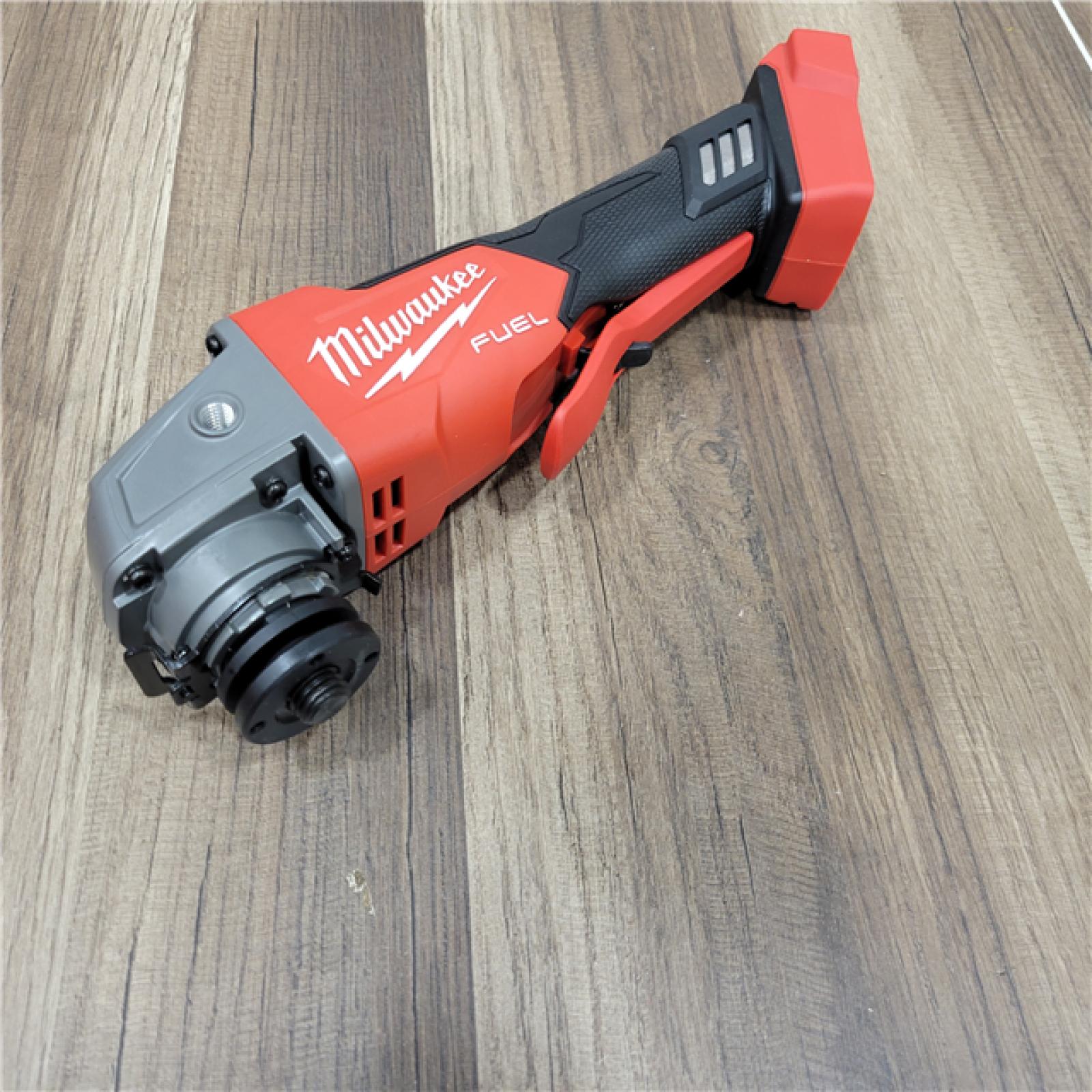 AS-IS Milwaukee 2880-20 M18 FUEL 18-Volt Lithium-Ion Brushless Cordless 4-1/2 in./5 in. Grinder W/Paddle Switch (Tool-Only)