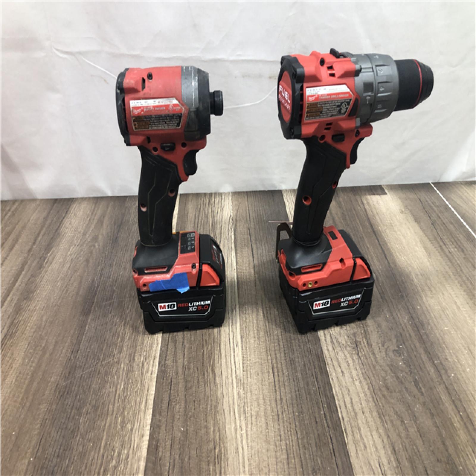 AS-IS Milwaukee  FUEL 18V Lithium-Ion Brushless Cordless Hammer Drill and Impact Driver Combo Kit
