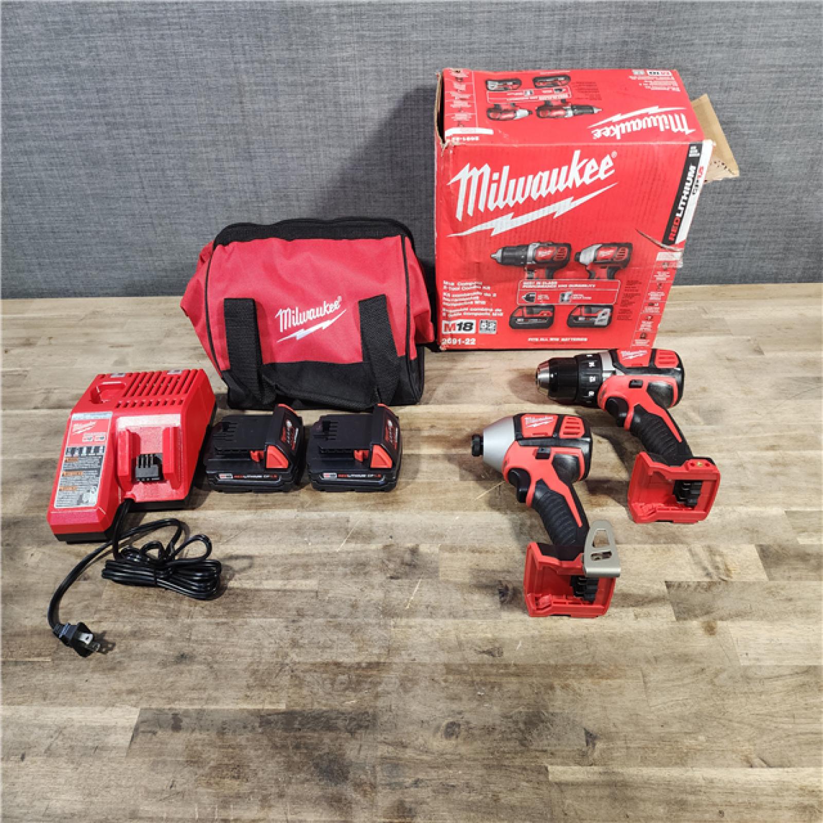 HOUSTON LOCATION - AS-IS Milwaukee 18V Cordless Brushed 2 Tool Drill/Driver and Impact Driver Kit