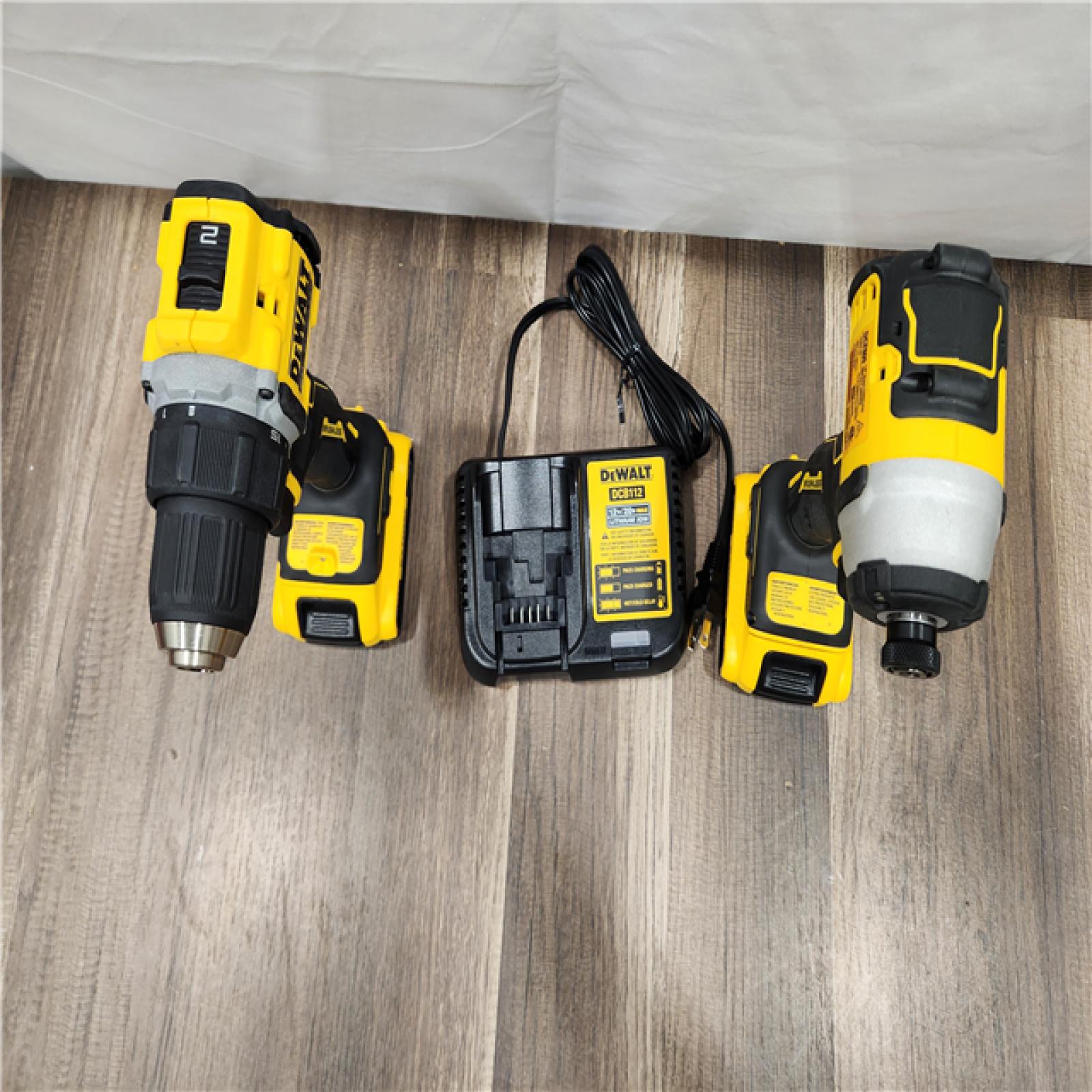 AS-IS Dewalt 20V MAX ATOMIC Brushless Compact Lithium-Ion 1/2 in. Cordless Drill Driver and 1/4 in. Impact Driver Combo Kit with 2 Batteries 2 Ah