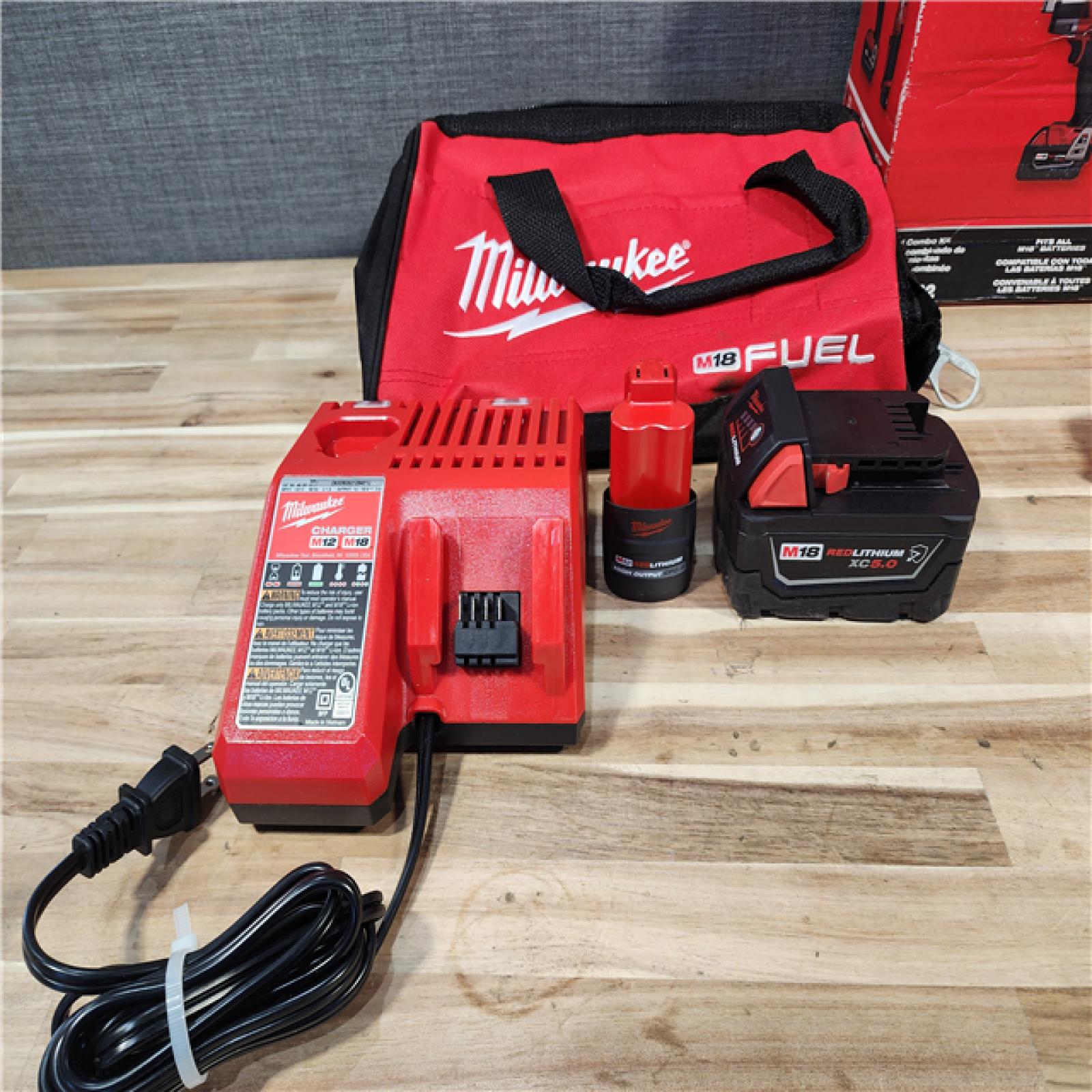 HOUSTON LOCATION - AS-IS Milwaukee FUEL 18V Cordless Mid Torque 1/2 in. Impact Wrench w/ M12 FUEL 3/8 in. Ratchet & Battery/Charger Combo Kit