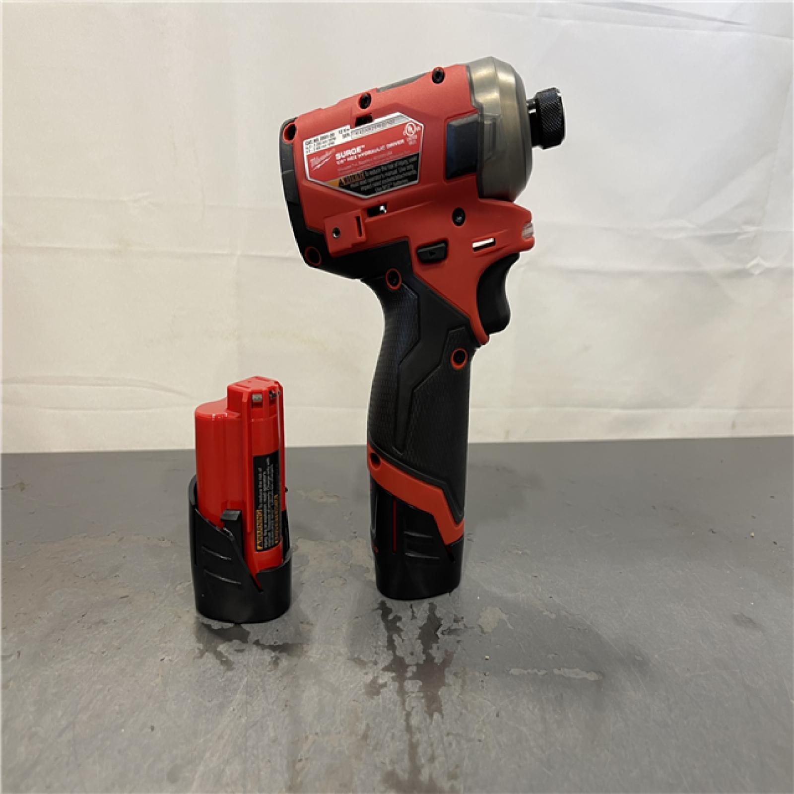 AS-IS - Milwaukee M12 FUEL SURGE 12V Lithium-Ion Brushless Cordless 1/4 in. Hex Impact Driver Compact Kit
