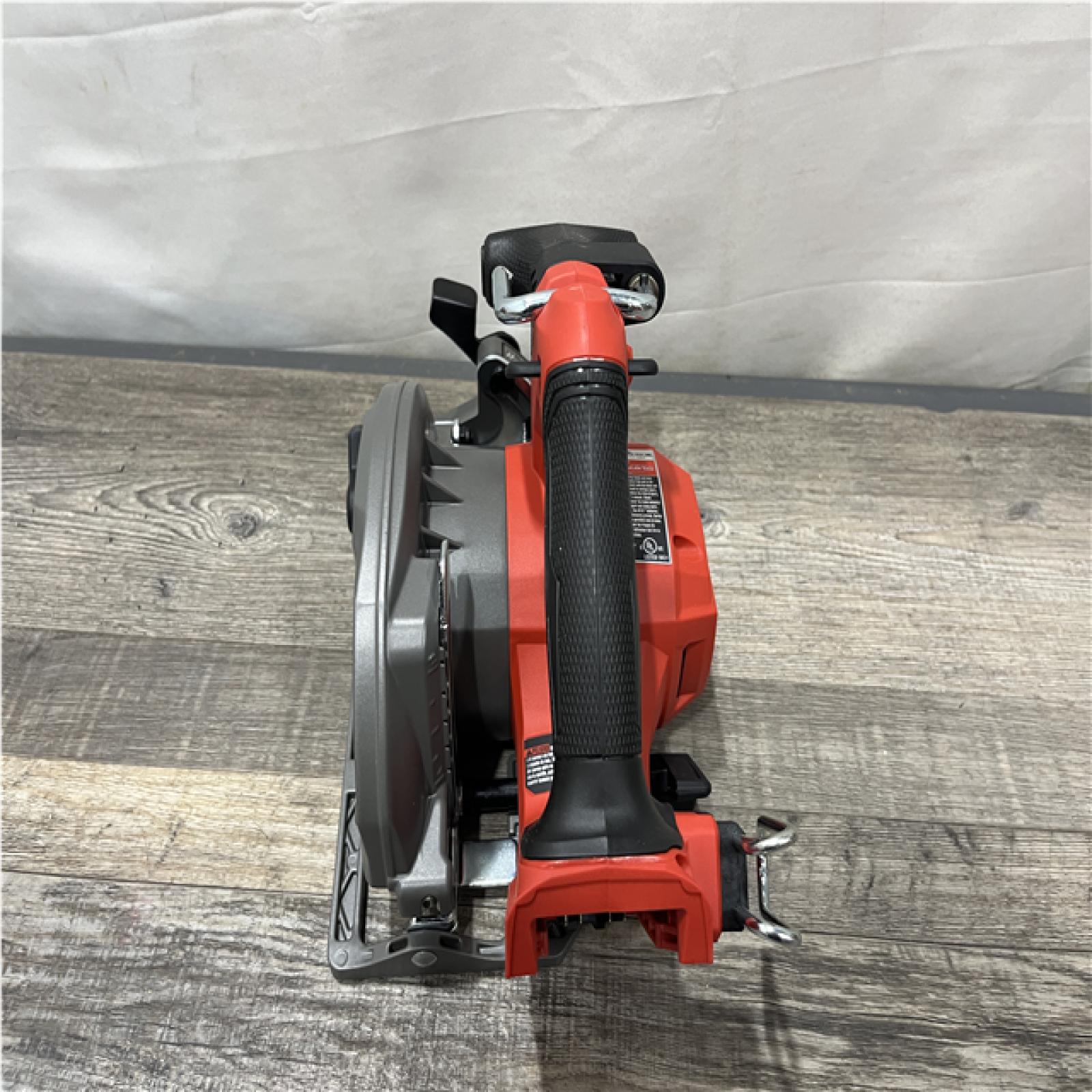 AS-IS Milwaukee FUEL 18V Lithium-Ion Brushless Cordless 6-1/2 in. Circular Saw (Tool-Only)