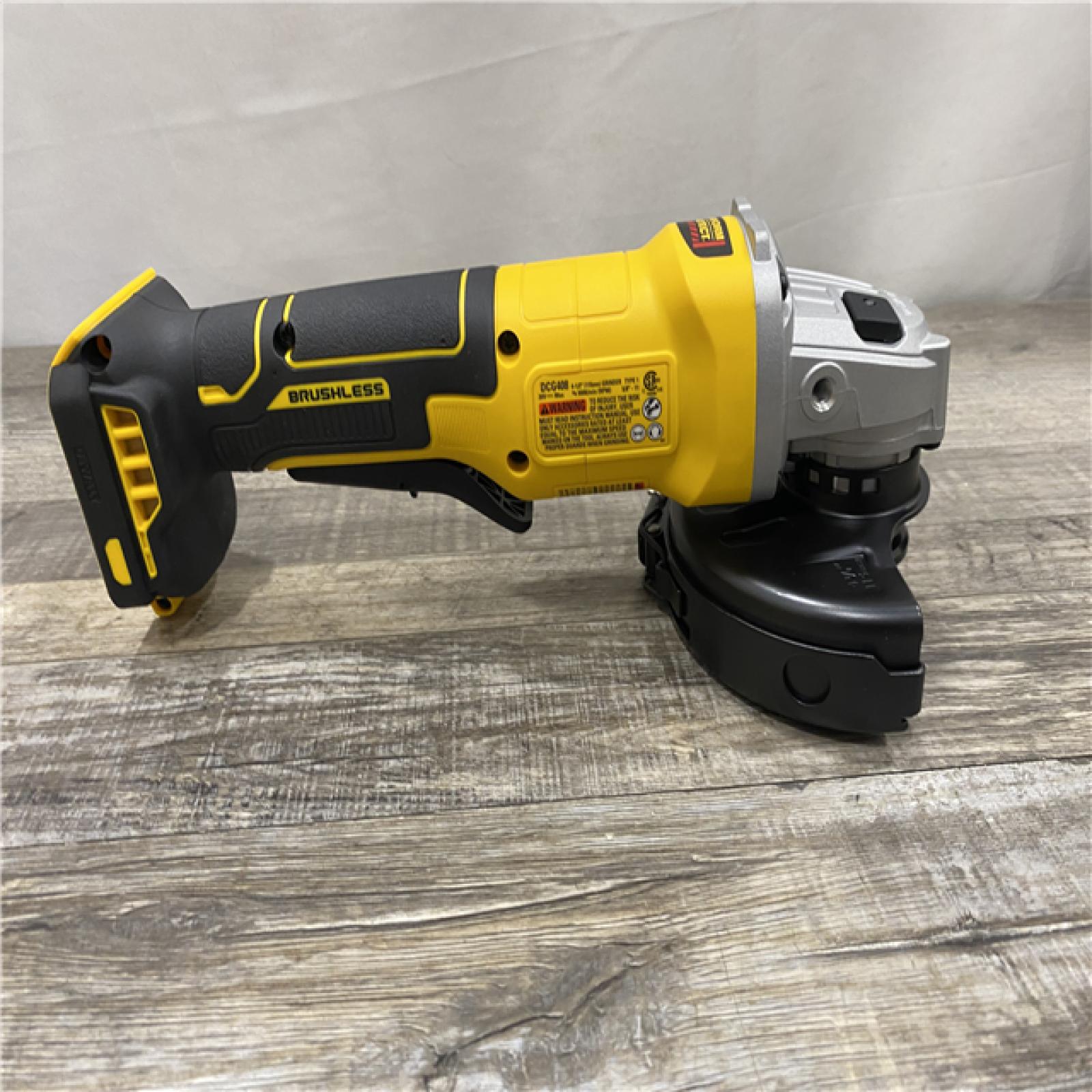 AS-IS DEWALT 20V MAX Cordless Brushless 4-1/2 in. Angle Grinder with Paddle Switch (Tool Only)