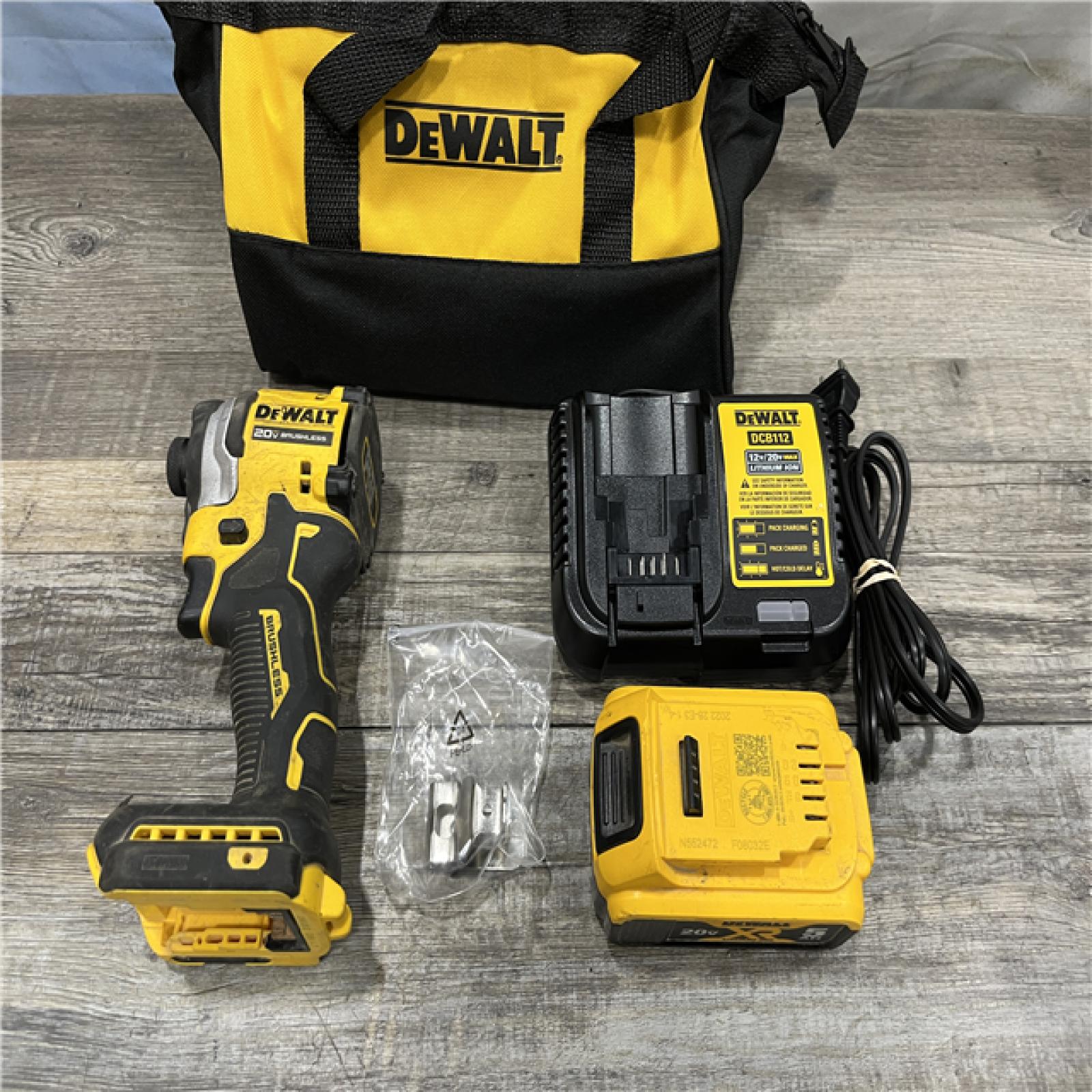 AS-IS DEWALT ATOMIC 20V MAX Lithium-Ion Cordless 1/4 in. Brushless Impact Driver Kit