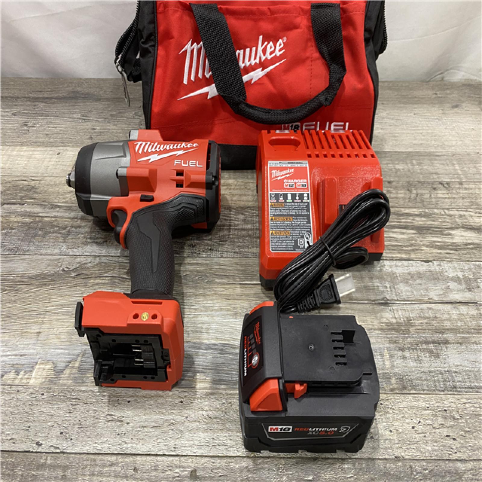 AS-IS Milwaukee FUEL 1/2 High Torque Impact Wrench with Friction Ring Kit