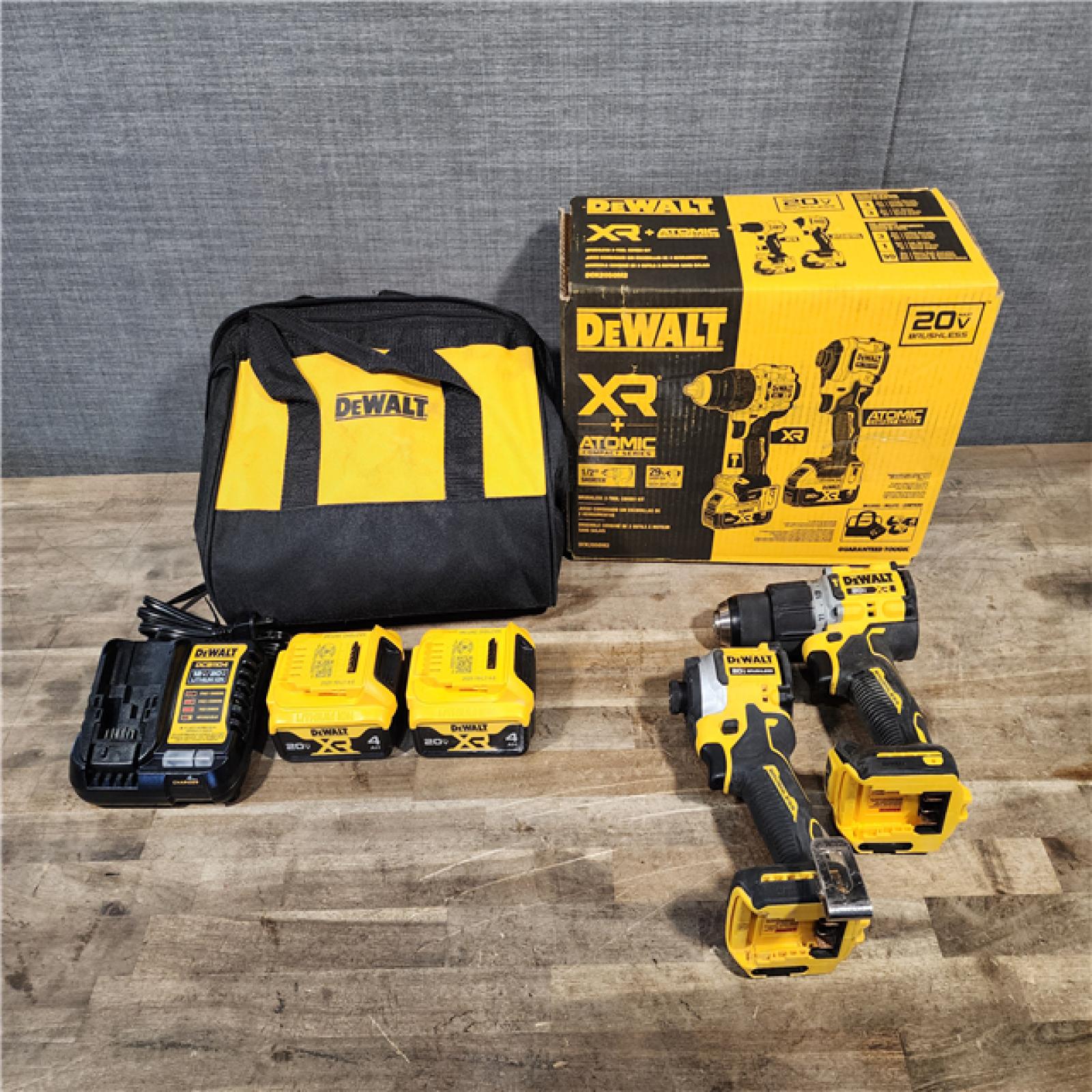 HOUSTON LOCATION - AS-IS DEWALT 20V MAX XR Hammer Drill and ATOMIC Impact Driver 2 Tool Cordless Combo Kit with (2) 4.0Ah Batteries  Charger  and Bag