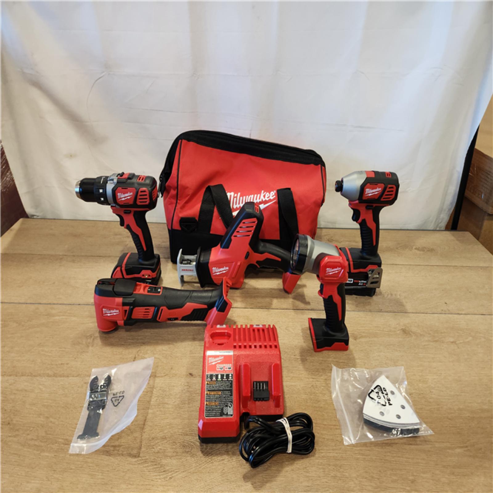 AS-IS- M18 18V Lithium-Ion Cordless Combo Kit (5-Tool) with (2) Batteries  Charger and Tool Bag