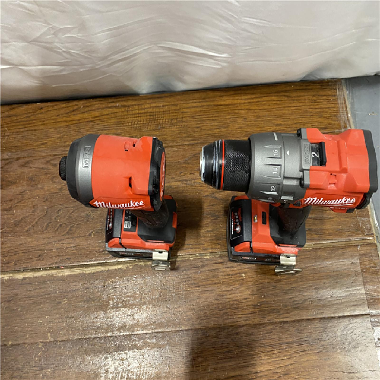 AS- IS MILWAUKEE M18 FUEL 18V Lithium-Ion Brushless Cordless Hammer Drill and Impact Driver Combo Kit (2-Tool) with 2 Batteries