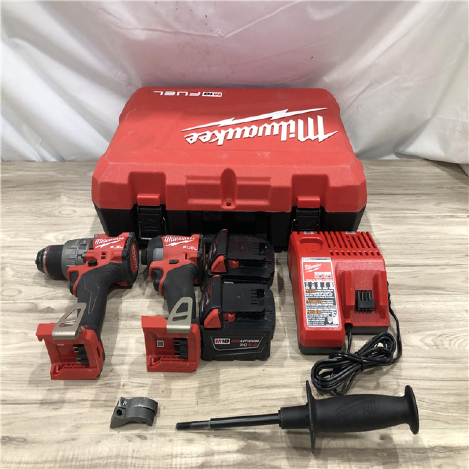 AS-IS Milwaukee FUEL 18V Lithium-Ion Cordless Hammer Drill and Impact Driver Combo Kit
