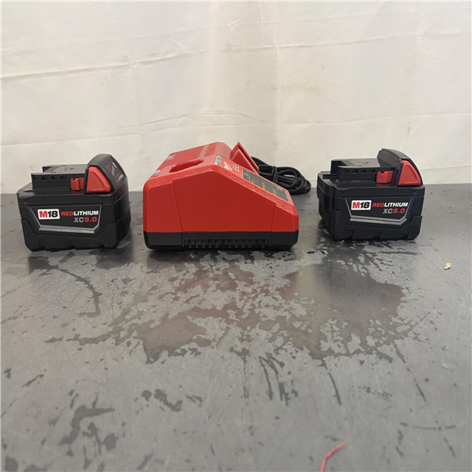 AS-IS- M18 18-Volt Lithium-Ion XC Starter Kit with Two 5.0Ah Batteries and Charger