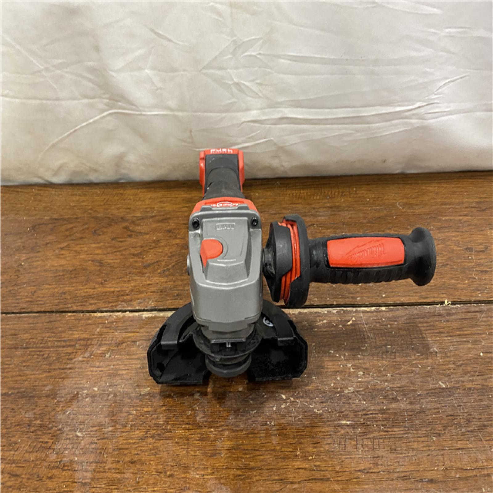 AS-IS Milwaukee 2880-20 M18 FUEL 18-Volt Lithium-Ion Brushless Cordless 4-1/2 in./5 in. Grinder W/Paddle Switch (Tool-Only)