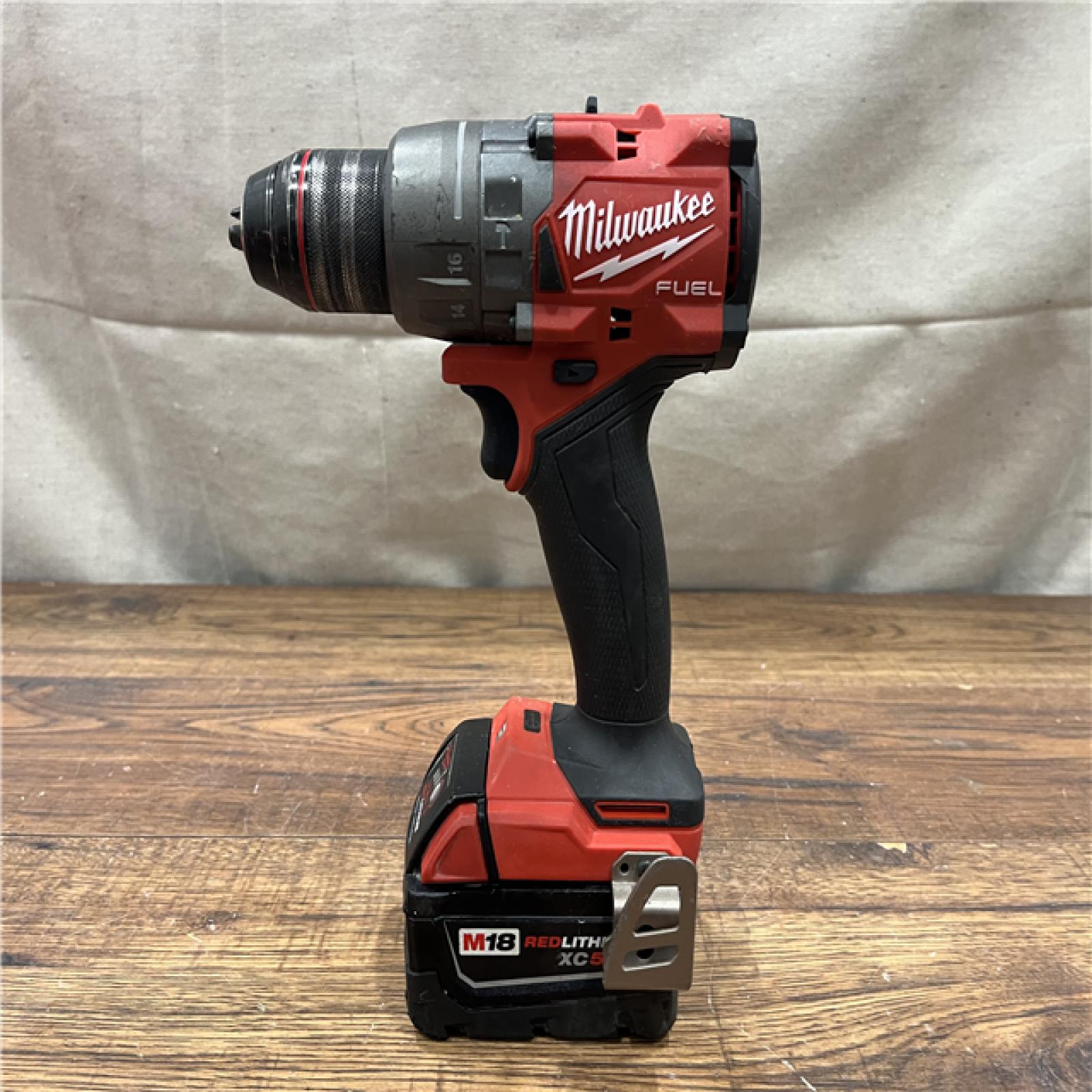 AS-IS MILWAUKEE M18 FUEL 18V Lithium-Ion Brushless Cordless Hammer Drill and Impact Driver Combo Kit (2-Tool) with 2 Batteries