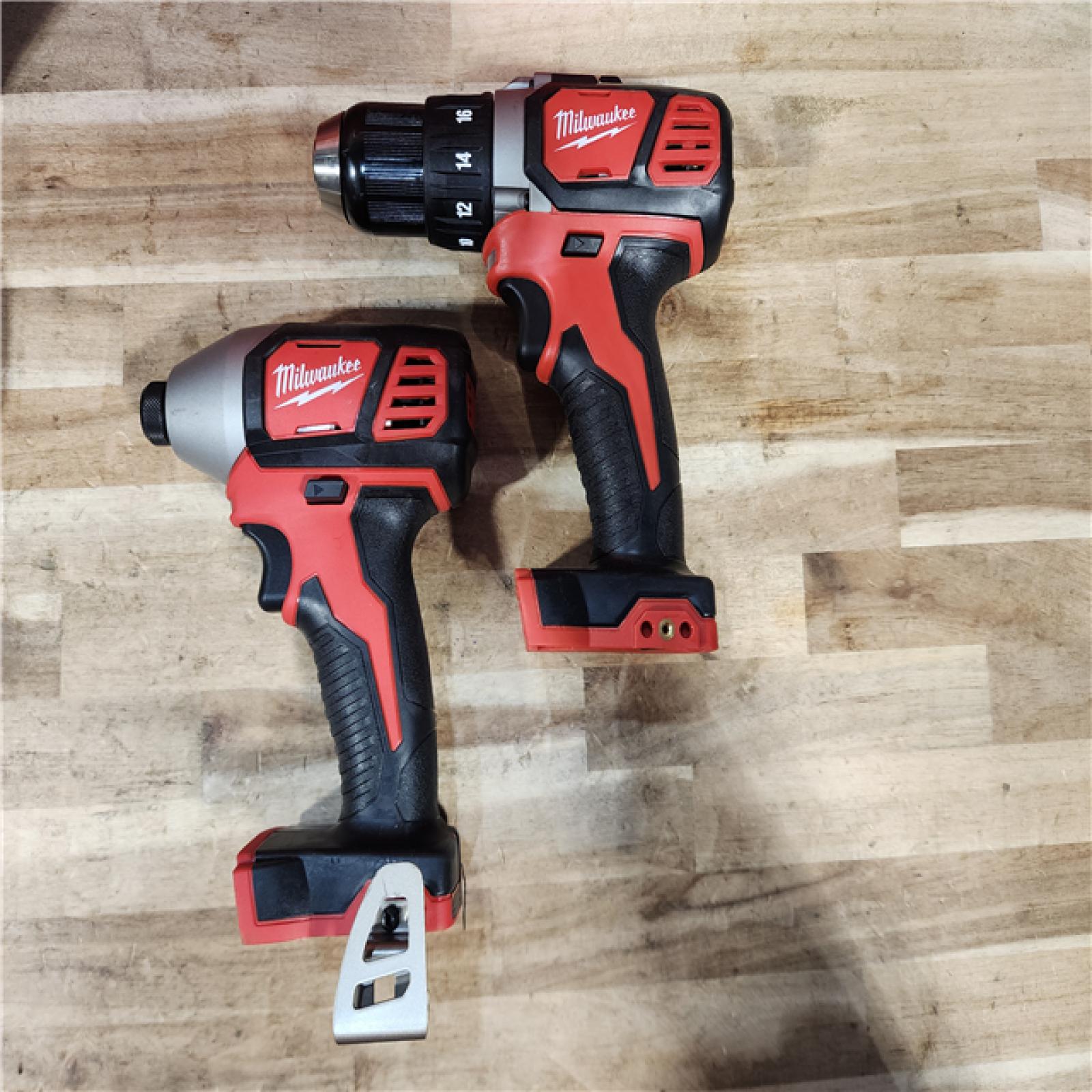 HOUSTON LOCATION - AS-IS Milwaukee M18 18V Lithium-Ion Cordless Drill Driver/Impact Driver Combo Kit