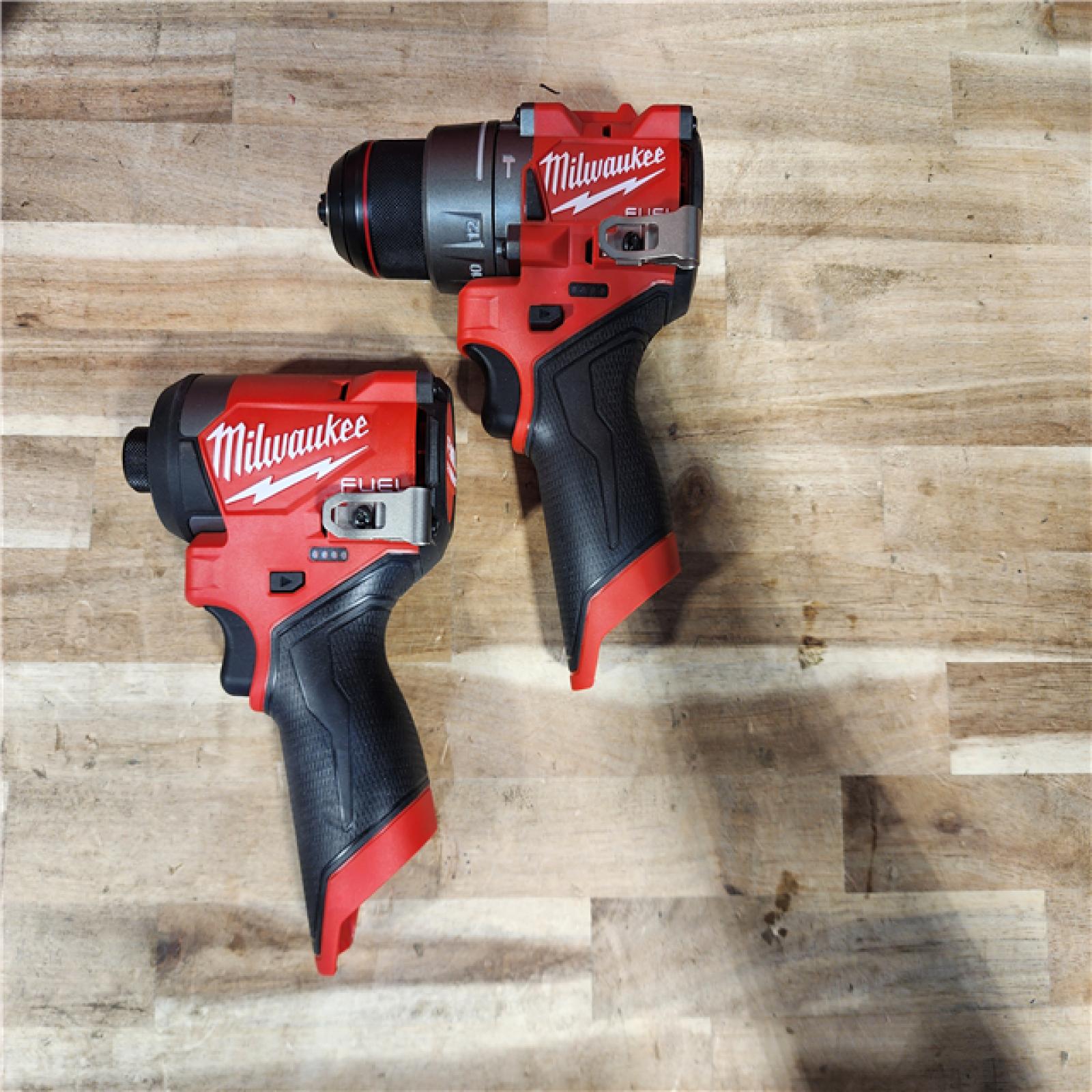 HOUSTON LOCATION - AS-IS Milwaukee  FUEL 12-Volt Lithium-Ion Brushless Cordless Hammer Drill and Impact Driver Combo Kit