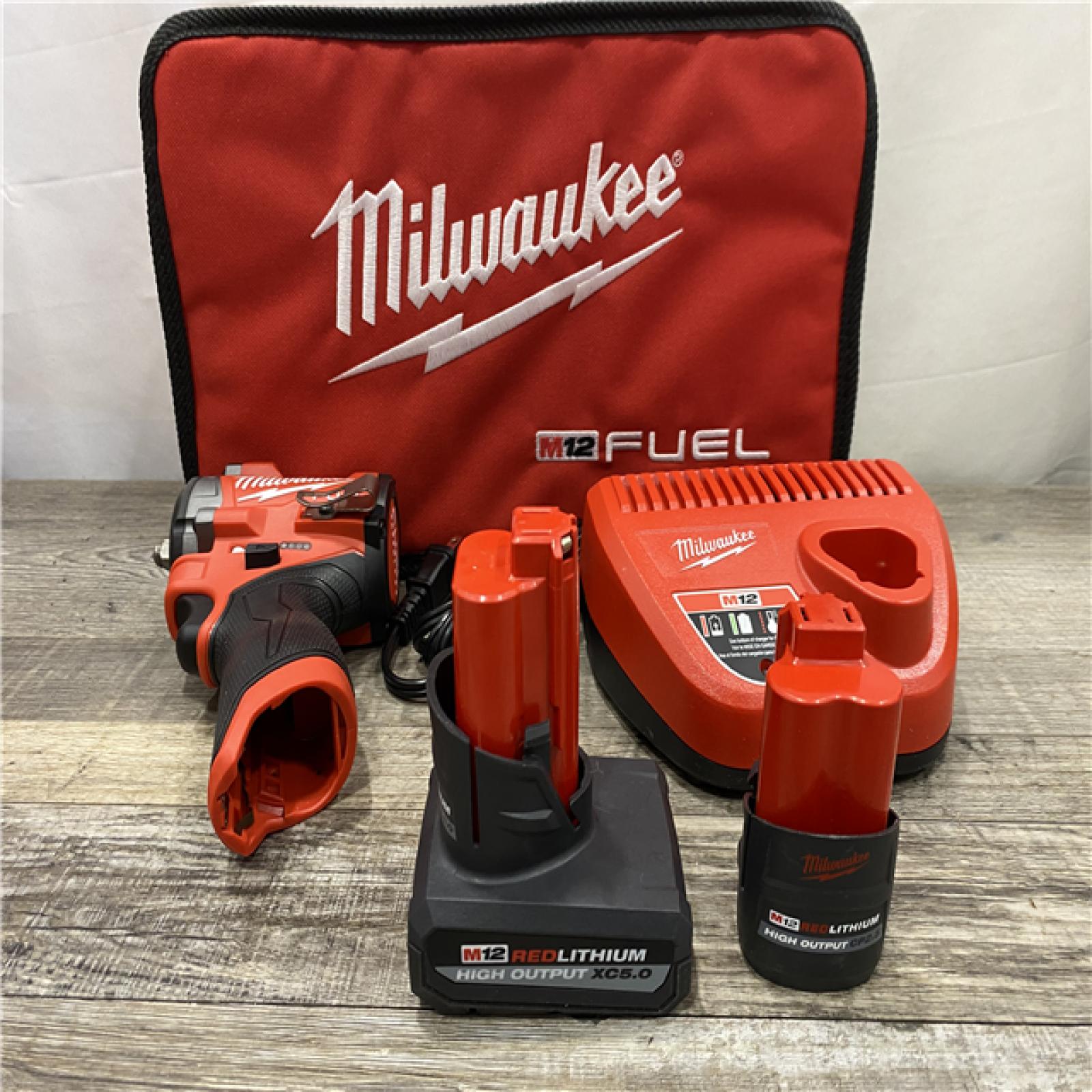 AS-IS Milwaukee FUEL 12V Li-Ion Brushless Cordless Stubby 3/8 in. Impact Wrench Kit