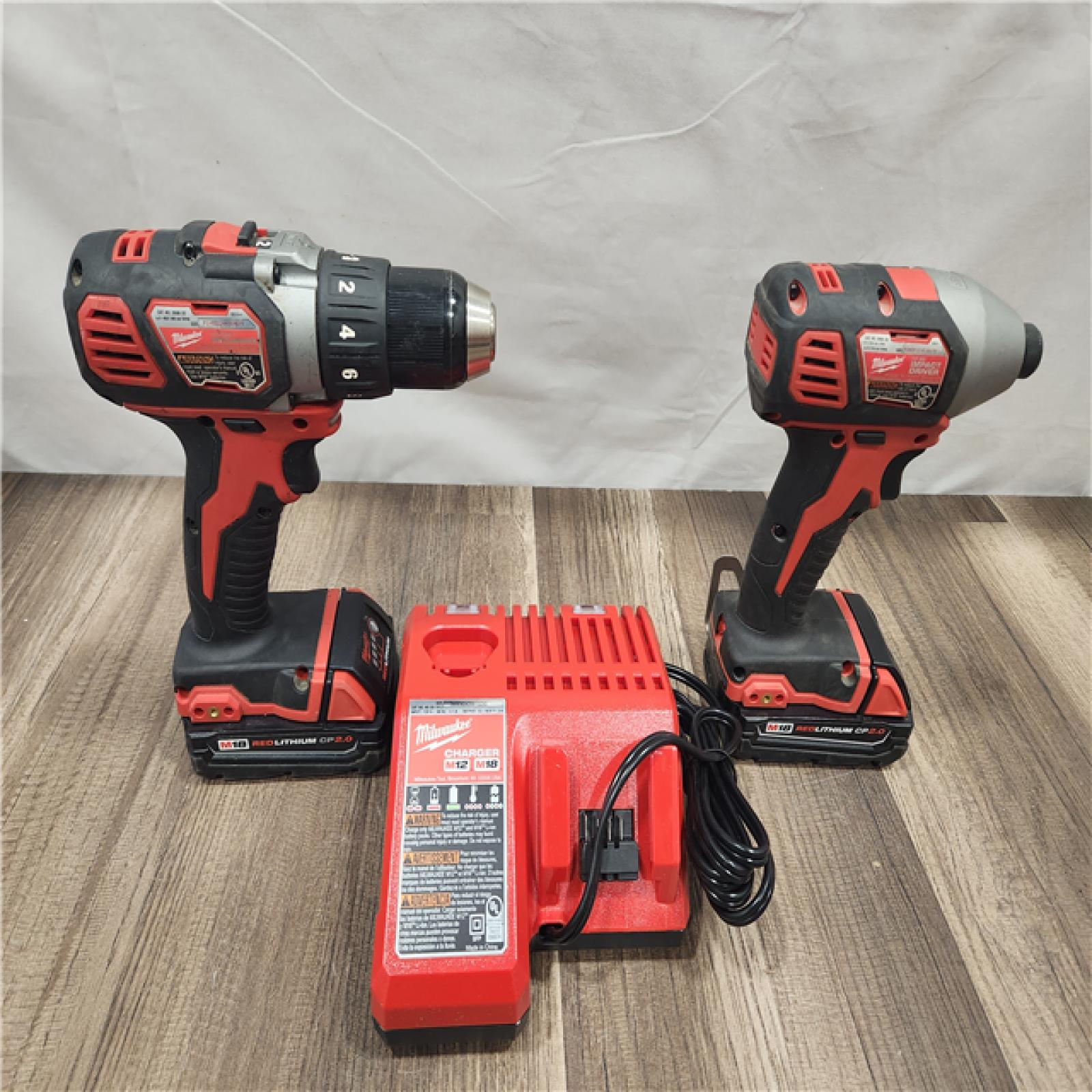 AS-IS- Milwaukee 18V Cordless Brushed 2-Tool Drill/Driver and Impact Driver Kit