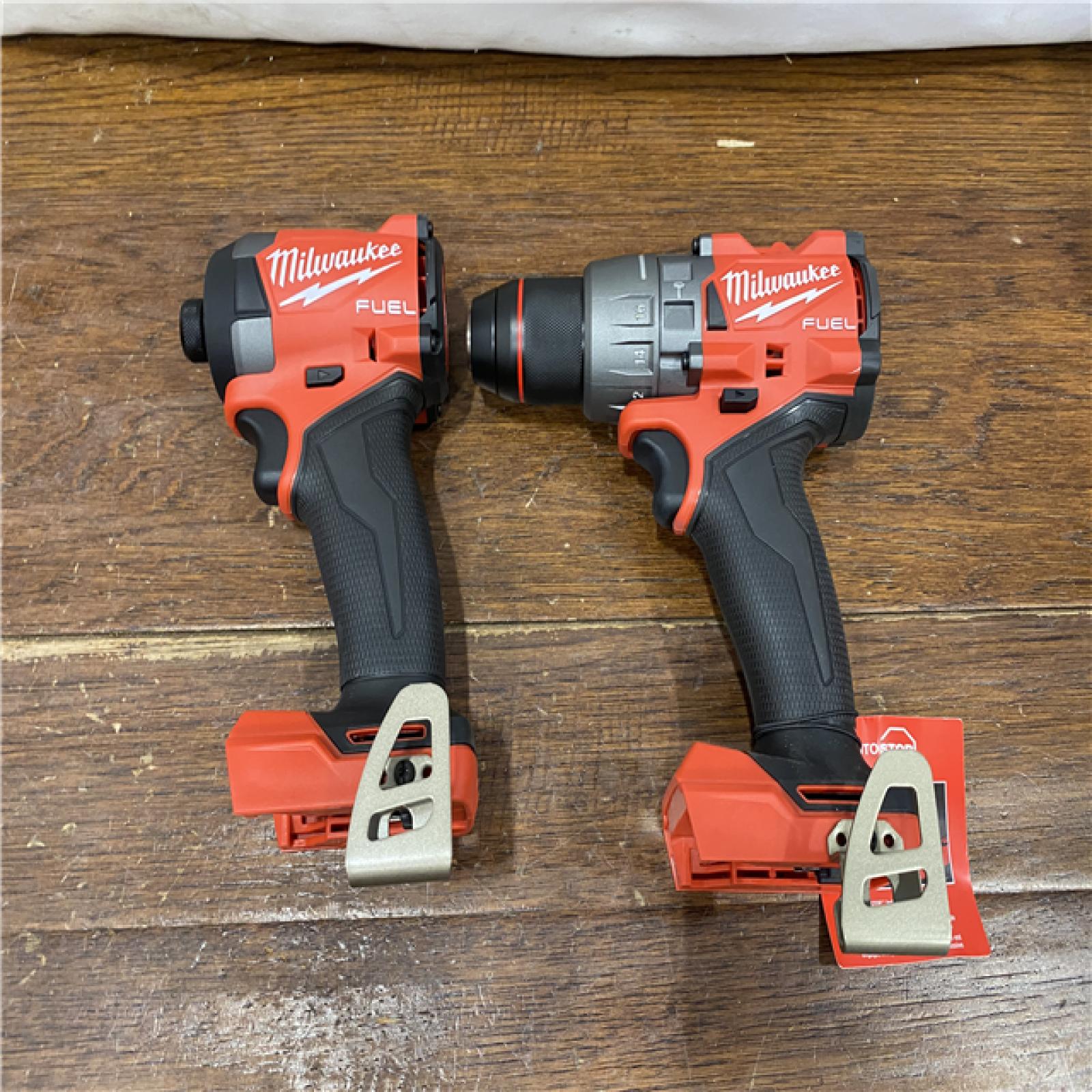 AS-IS MILWAUKEE M18 FUEL 18V Lithium-Ion Brushless Cordless Hammer Drill and Impact Driver Combo Kit (2-Tool) with 2 Batteries