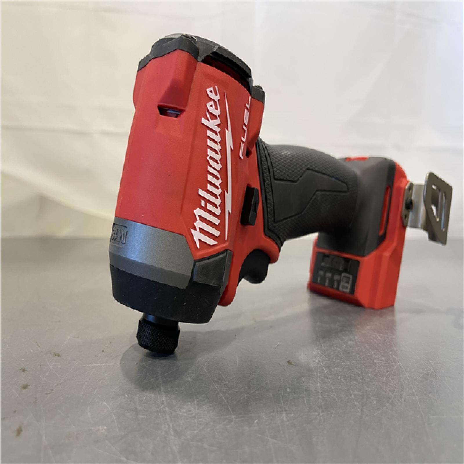 AS-IS - Milwaukee 18V Lithium-Ion Brushless Cordless 1/4 Hex Impact Driver Bare Tool  Red