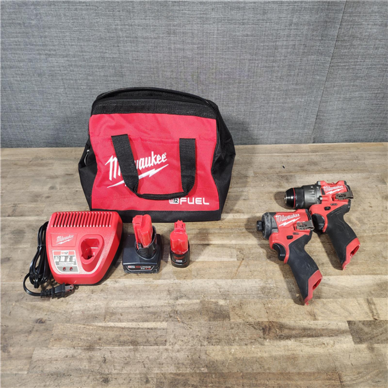 HOUSTON LOCATION - AS-IS Milwaukee 3497-22 12V Brushless Hammer Drill and Impact Driver Combo Kit