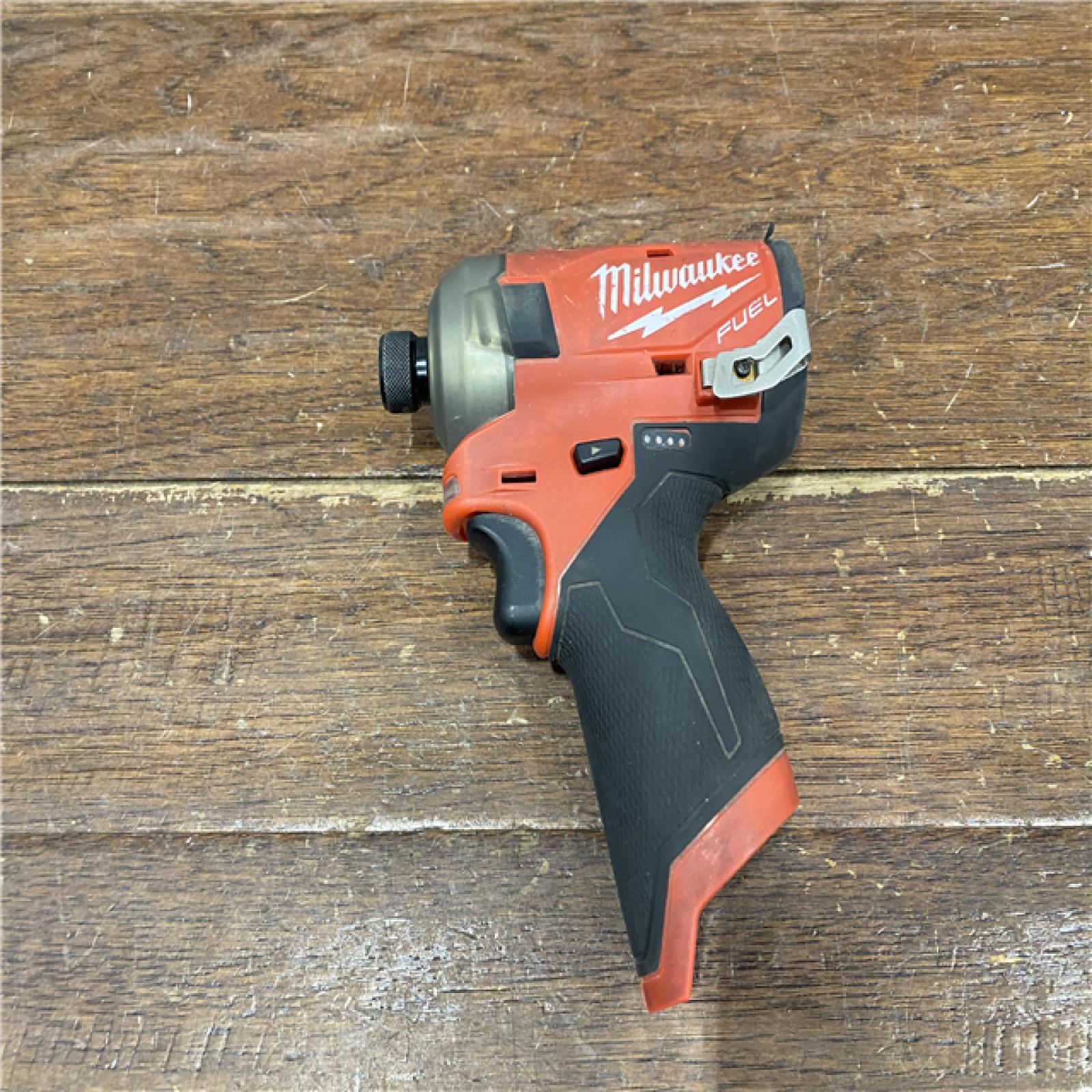 AS-IS M12 FUEL SURGE 12V Lithium-Ion Brushless Cordless 1/4 in. Hex Impact Driver Compact Kit W/Two 2.0Ah Batteries, Bag