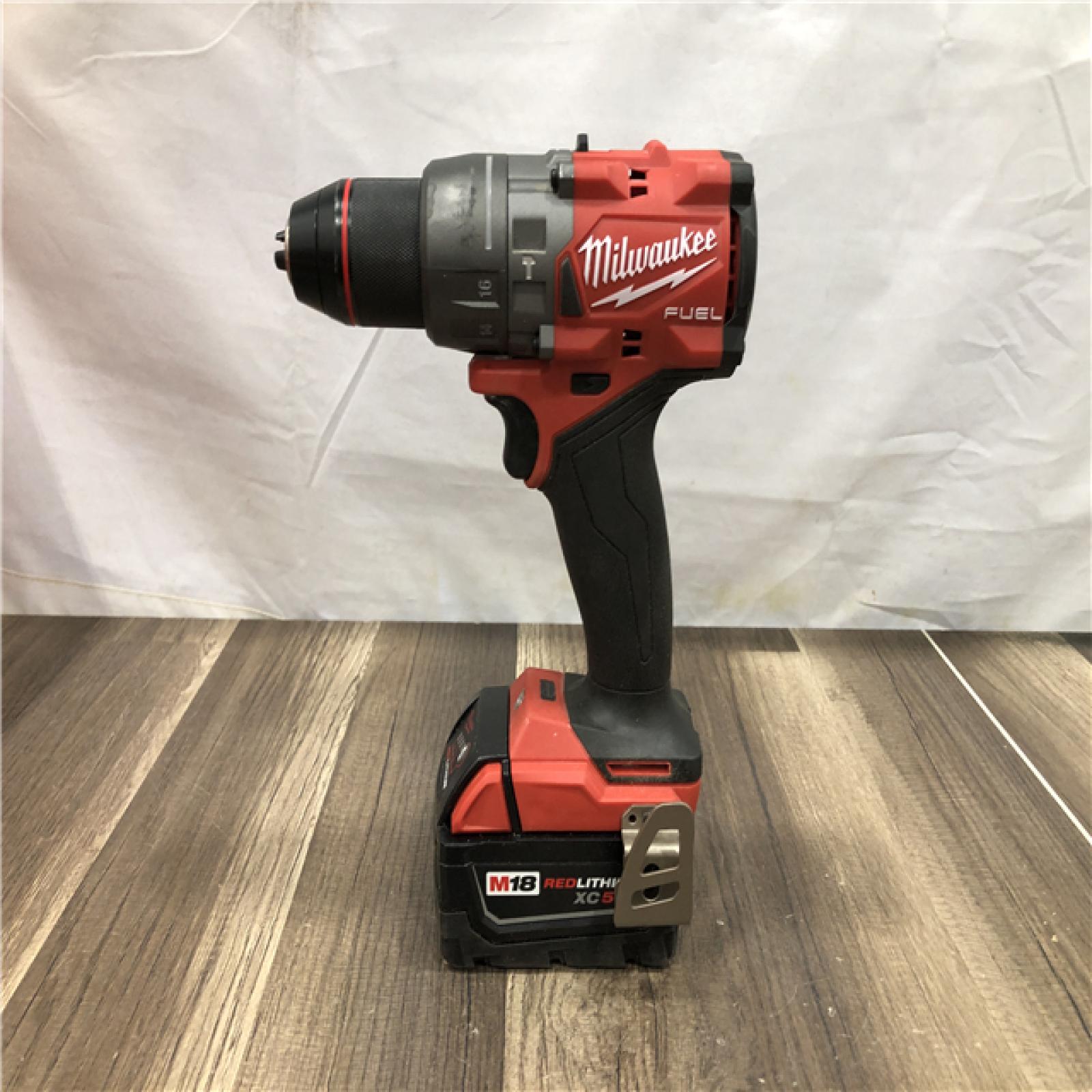 AS-IS Milwaukee FUEL 18V Lithium-Ion Brushless Cordless 1/2 in. Hammer Drill Driver Kit