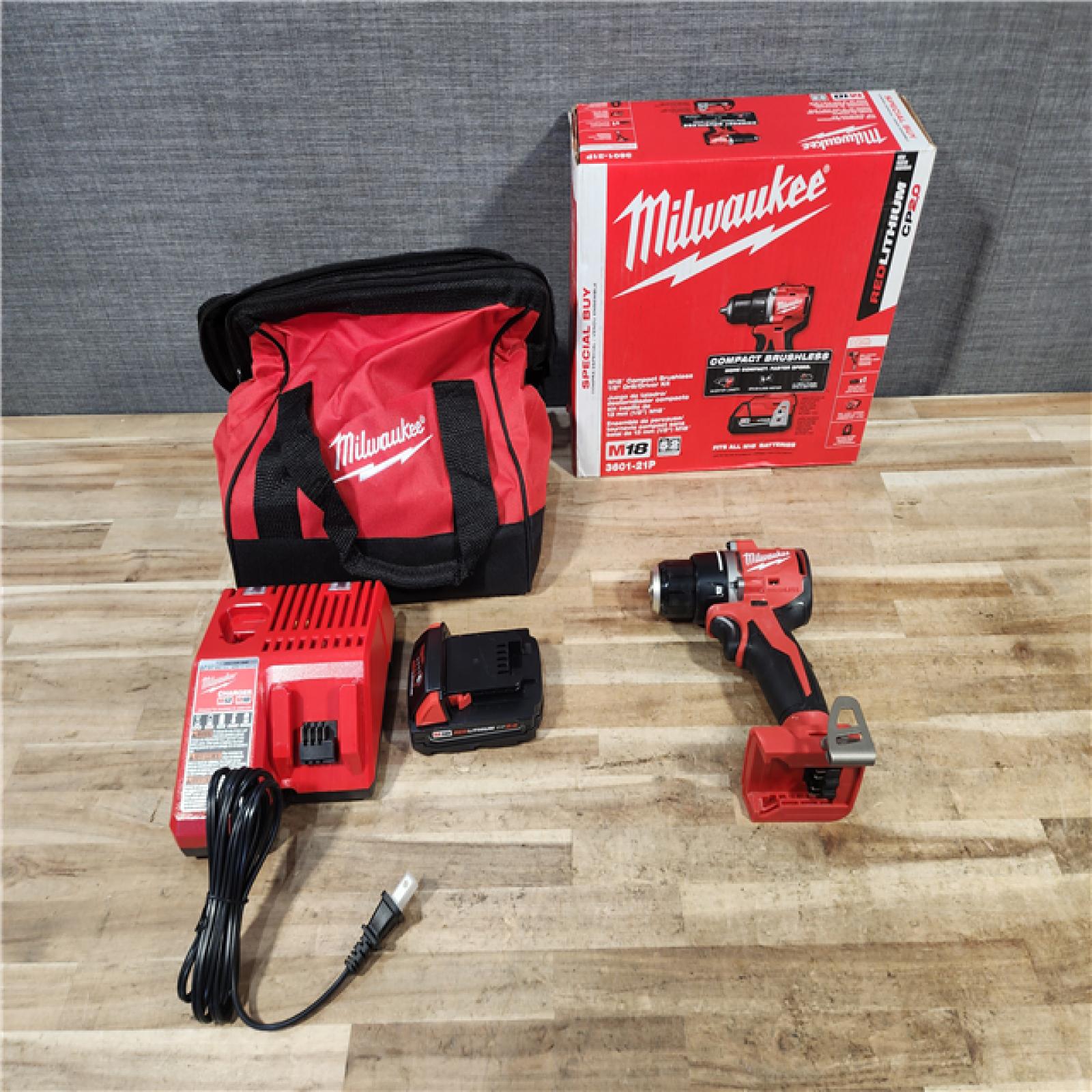 HOUSTON LOCATION - AS - IS Milwaukee 18V Lithium-Ion Brushless Cordless 1/2 in. Compact Drill/Driver with kit