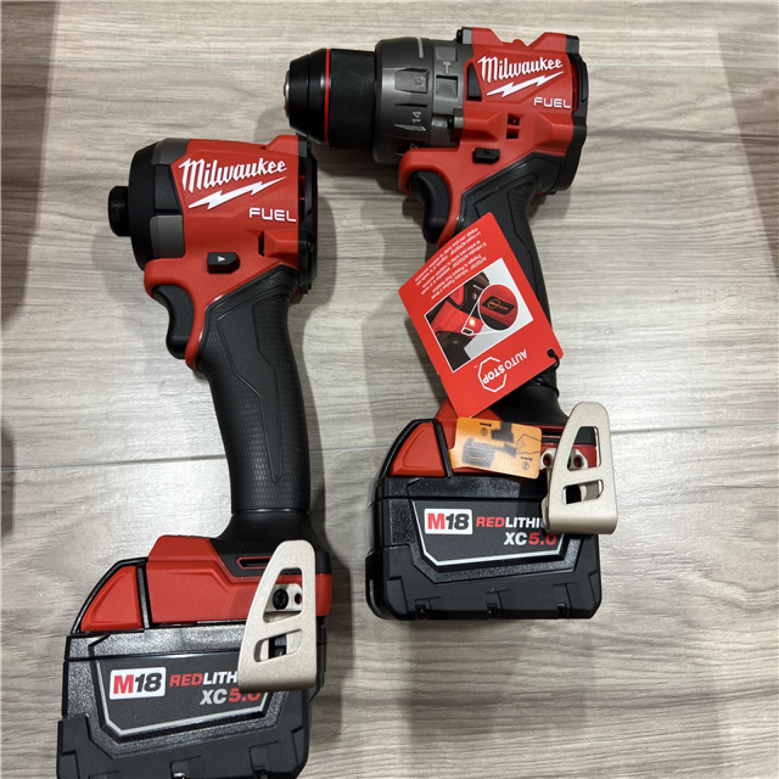 AS-IS Milwaukee FUEL 18V Lithium-Ion Brushless Cordless Hammer Drill and Impact Driver Combo Kit