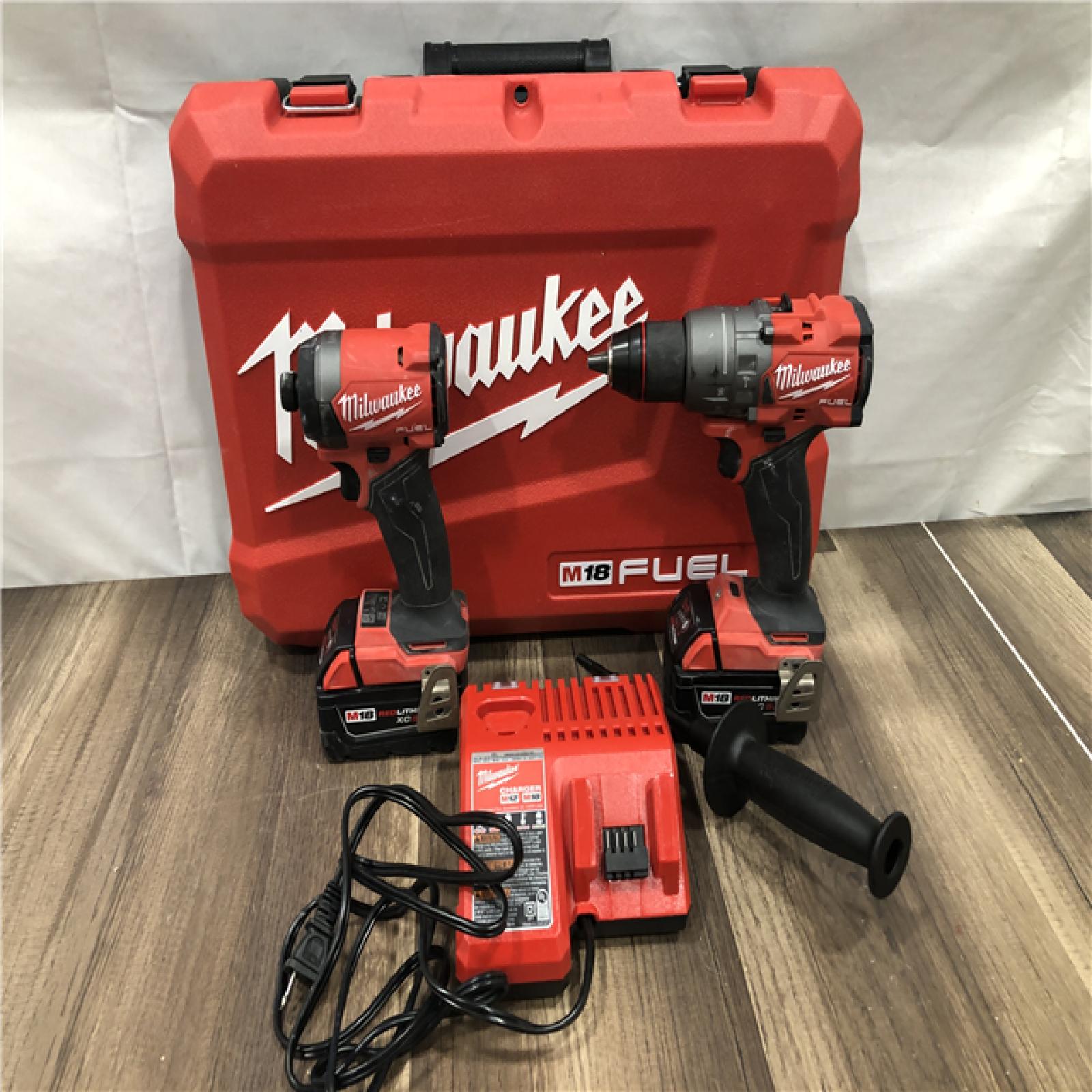 AS-IS Milwaukee FUEL 18V Lithium-Ion Brushless Cordless Hammer Drill and Impact Driver Combo Kit