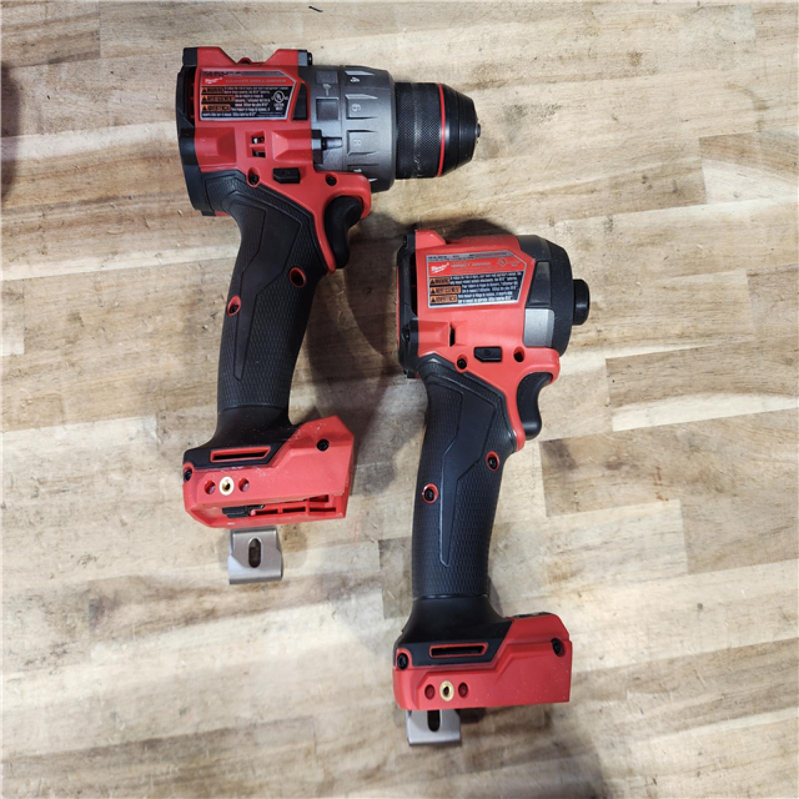 HOUSTON LOCATION - AS-IS Milwaukee FUEL 18V Lithium-Ion Brushless Cordless Hammer Drill and Impact Driver Combo Kit