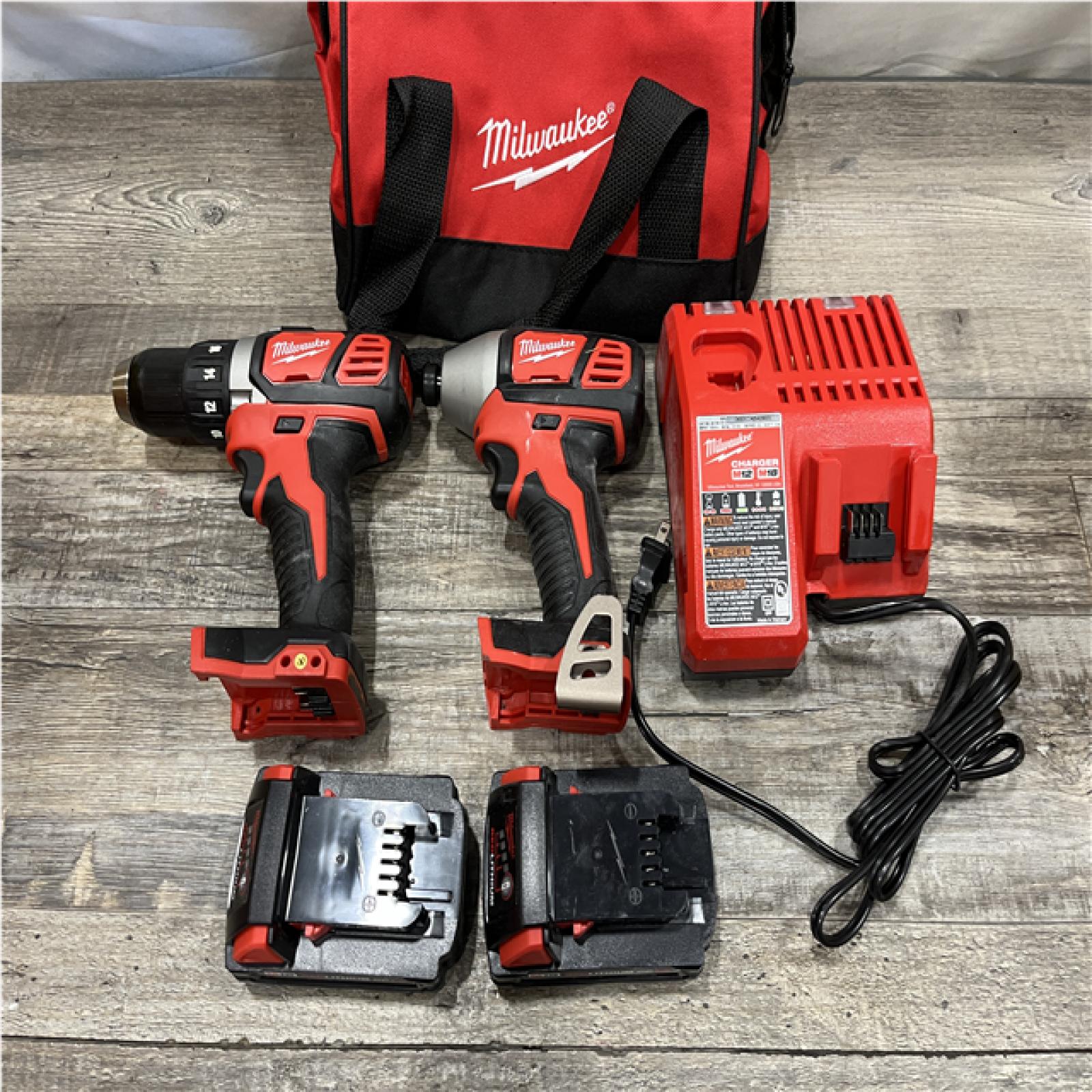 AS-IS Milwaukee 18V Lithium-Ion Cordless Drill Driver/Impact Driver Combo Kit