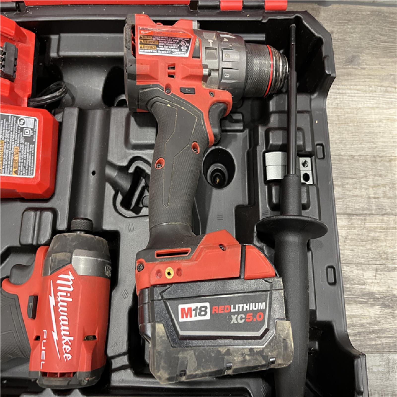 AS-IS Milwaukee FUEL 18V Lithium-Ion Brushless Cordless Hammer Drill and Impact Driver Combo Kit