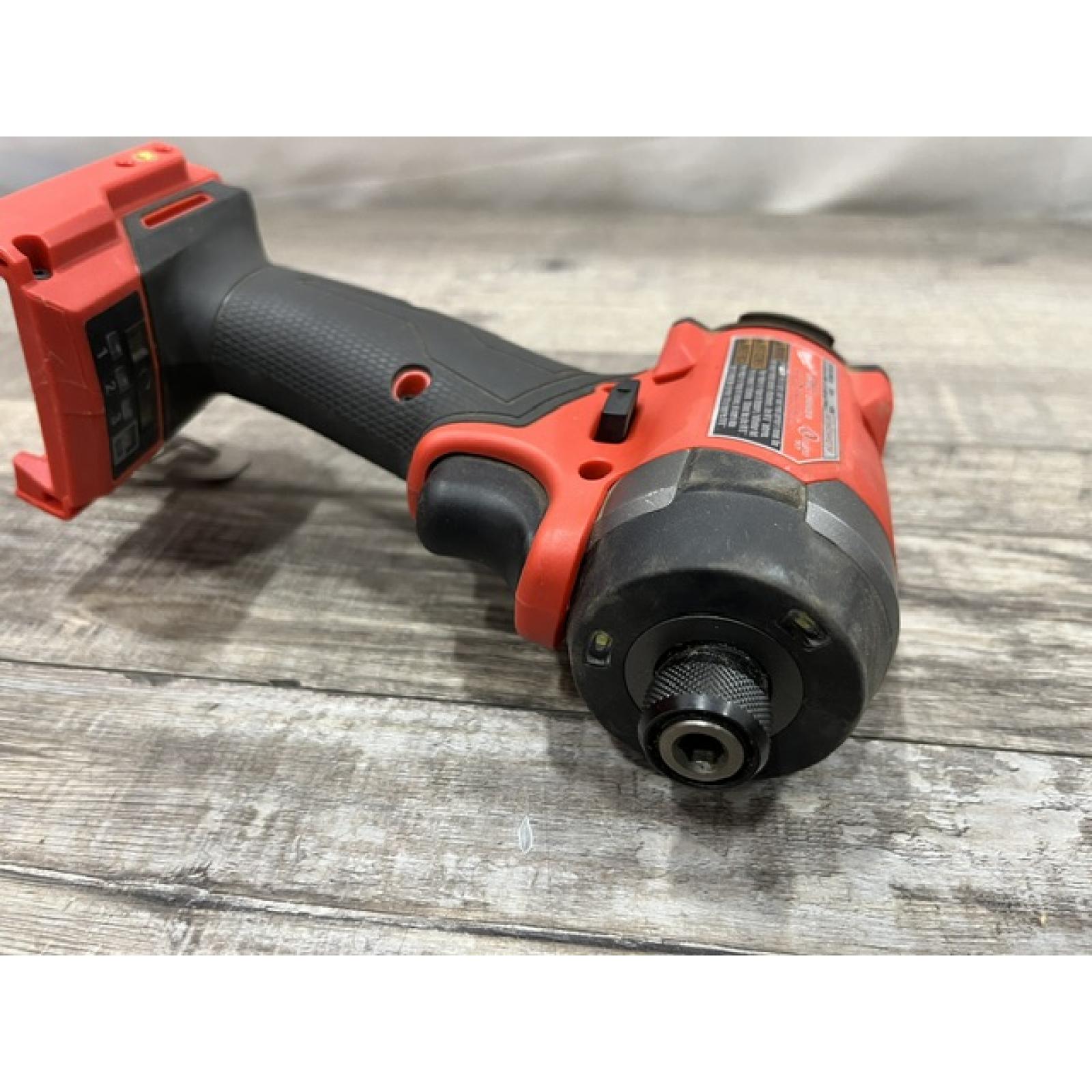 AS-IS Milwaukee FUEL 18V Lithium-Ion Brushless Cordless 1/4 in. Hex Impact Driver (Tool-Only)