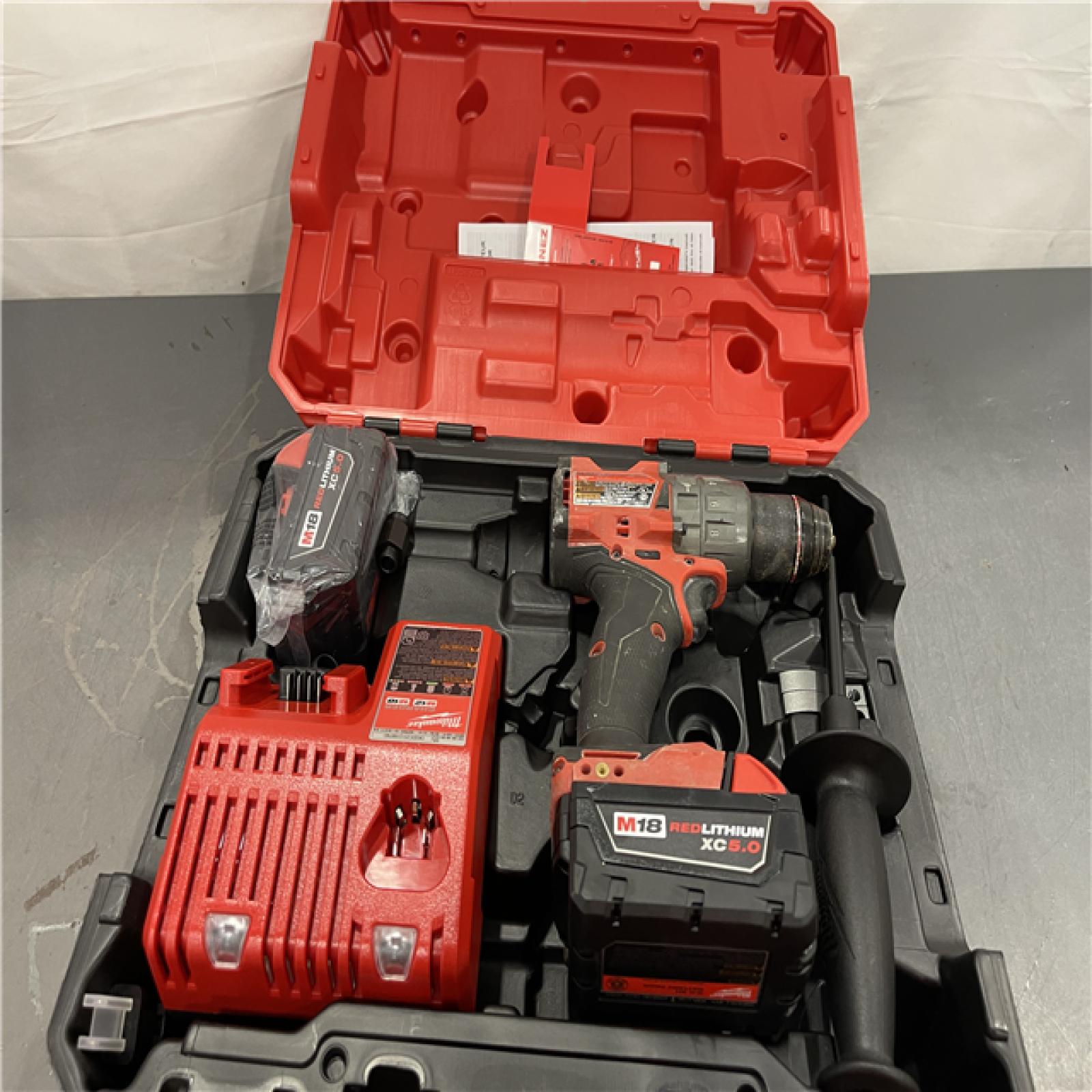 AS-IS - Milwaukee M18 FUEL 18V Lithium-Ion Brushless Cordless 1/2 in. Hammer Drill Driver Kit