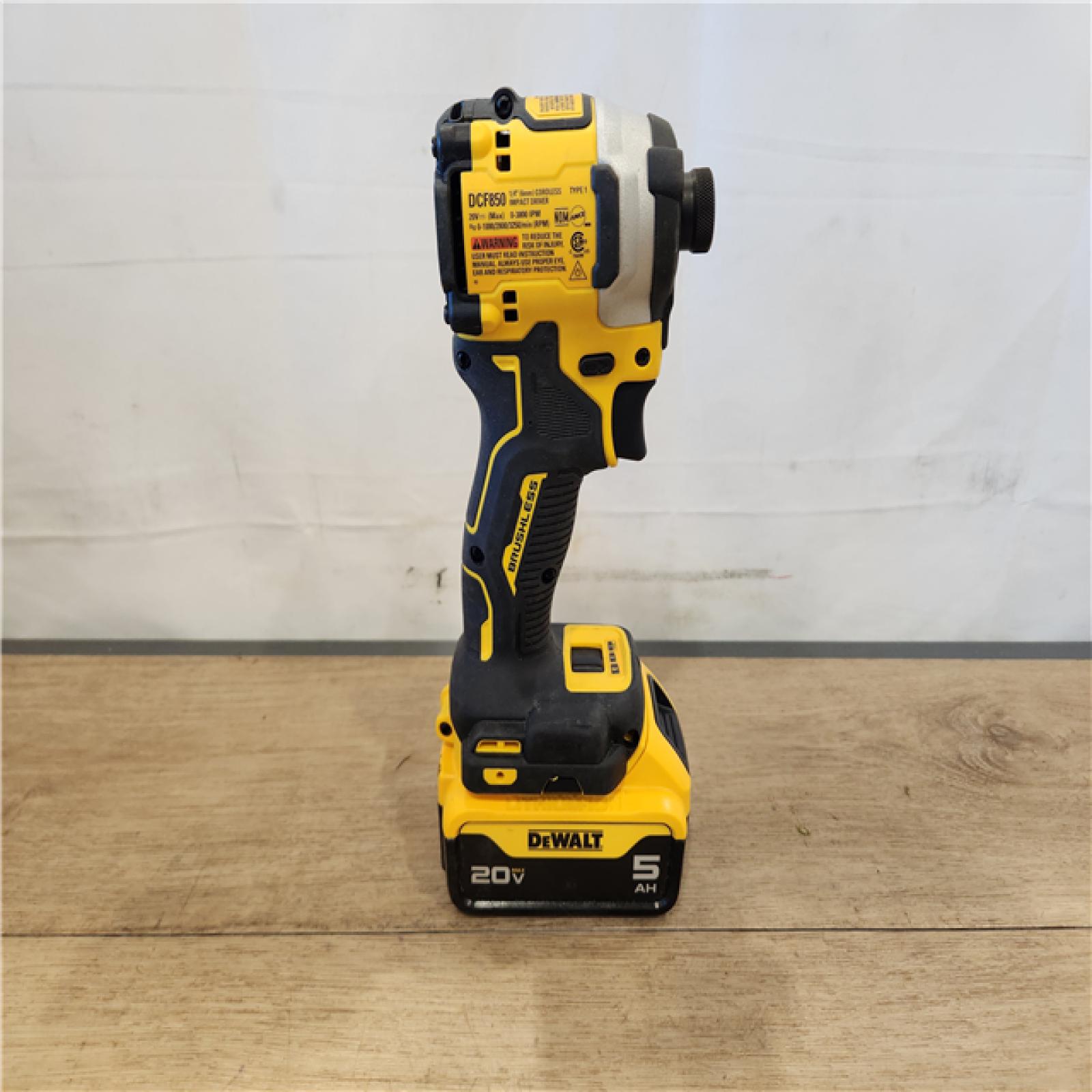 AS-IS- DEWALT ATOMIC 20V MAX Lithium-Ion Cordless 1/4 in. Brushless Impact Driver Kit  5 Ah Battery  Charger  and Bag