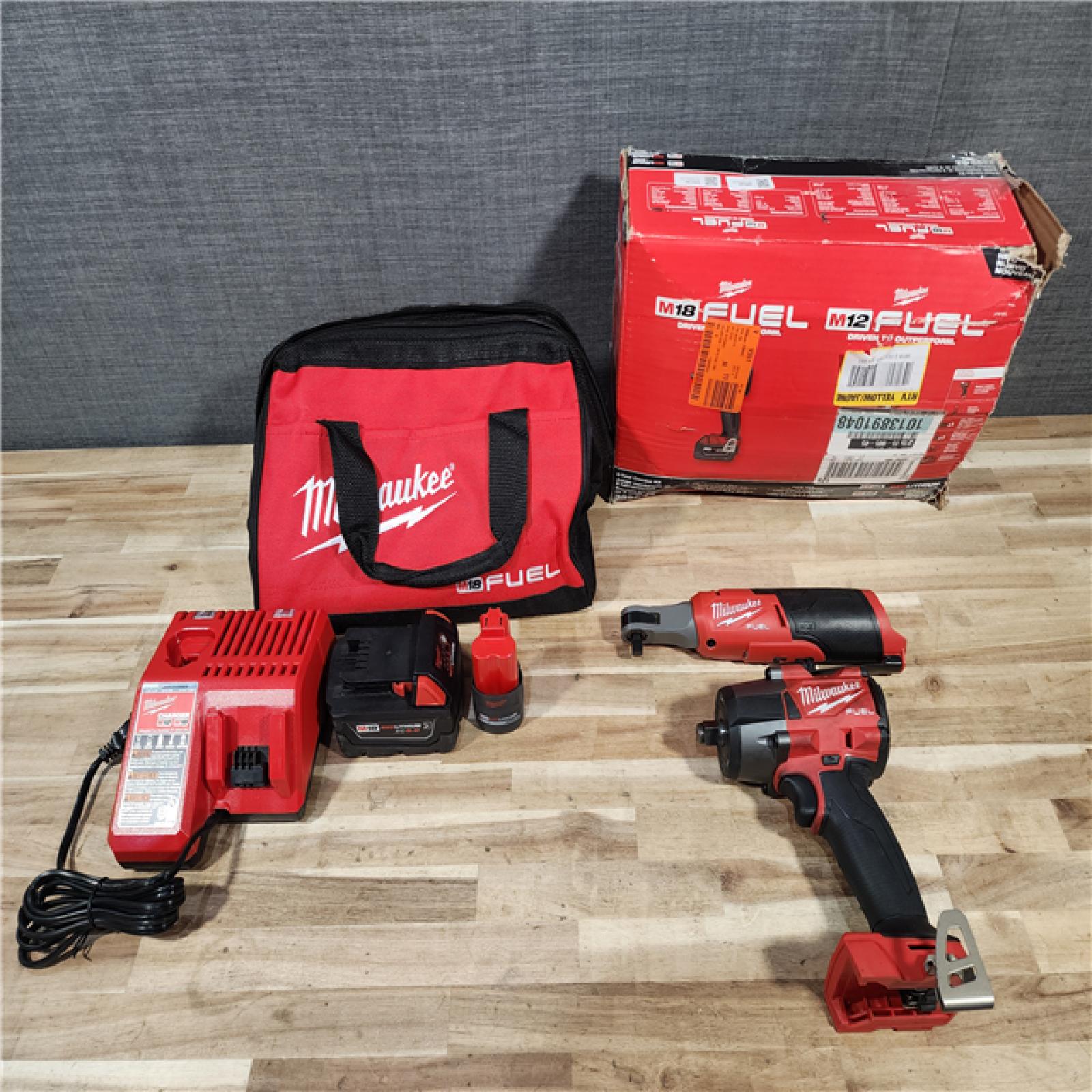 HOUSTON LOCATION - AS-IS Milwaukee FUEL 18V Cordless Mid Torque 1/2 in. Impact Wrench w/ M12 FUEL 3/8 in. Ratchet & Battery/Charger Combo Kit